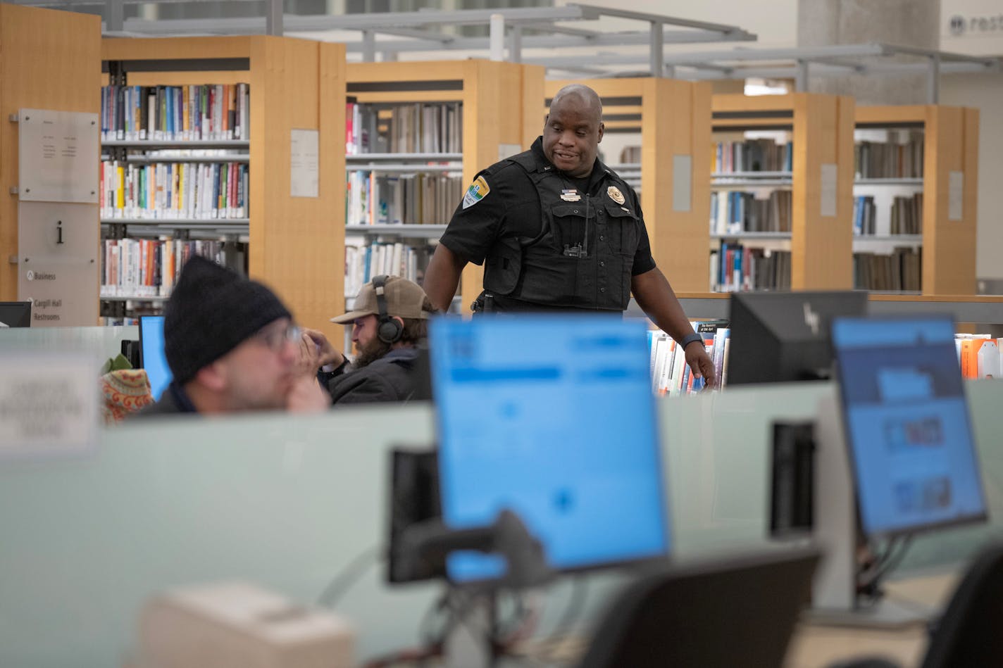 Hennepin County security officers Elijah Hannah patrolled the third floor of Central Library Thursday January ,4, 2024 in, Minneapolis, Minn. ] JERRY HOLT • jerry.holt@startribune.com