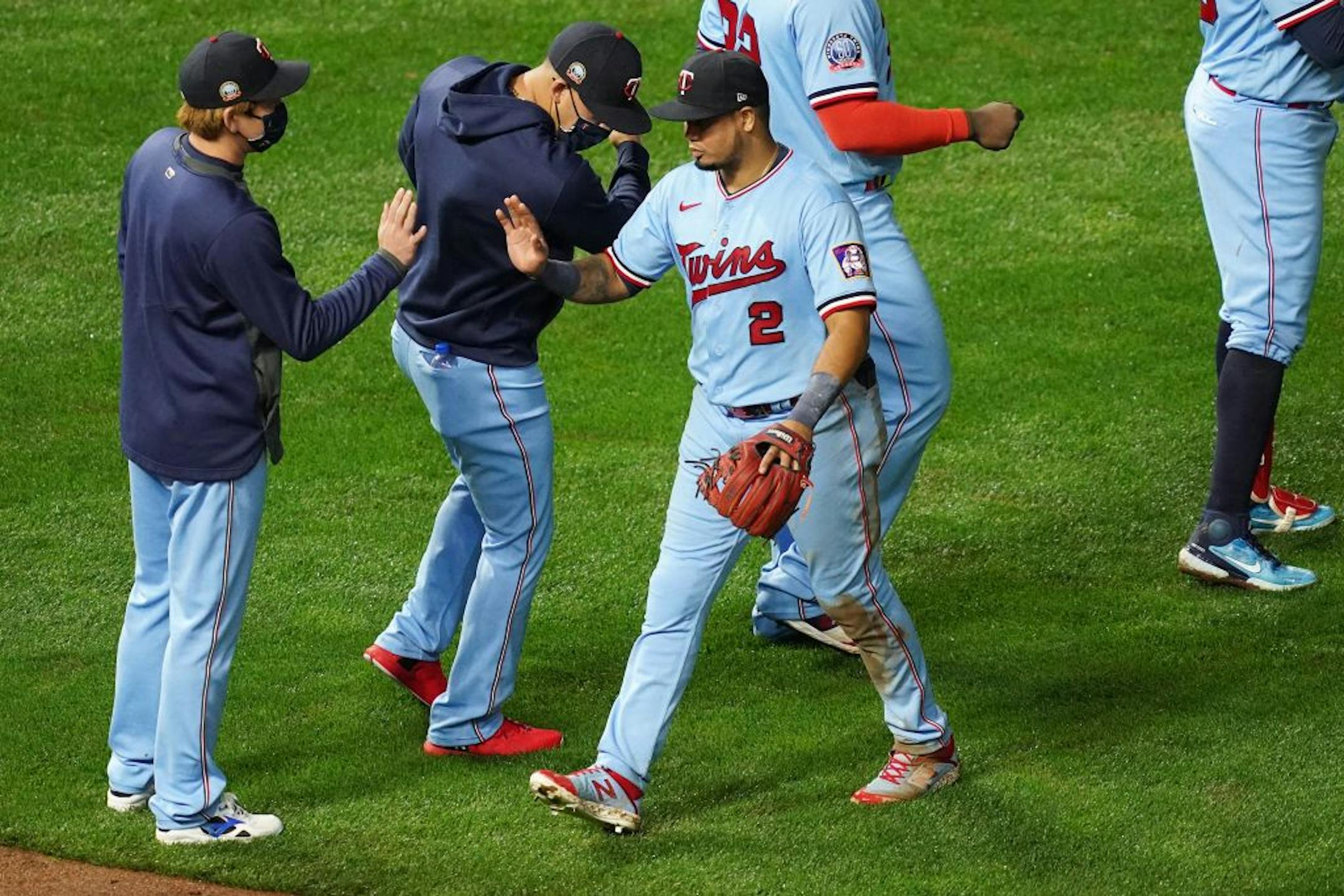 Minnesota Twins second baseman Luis Arráez (2) celebrated the win with his teammates.