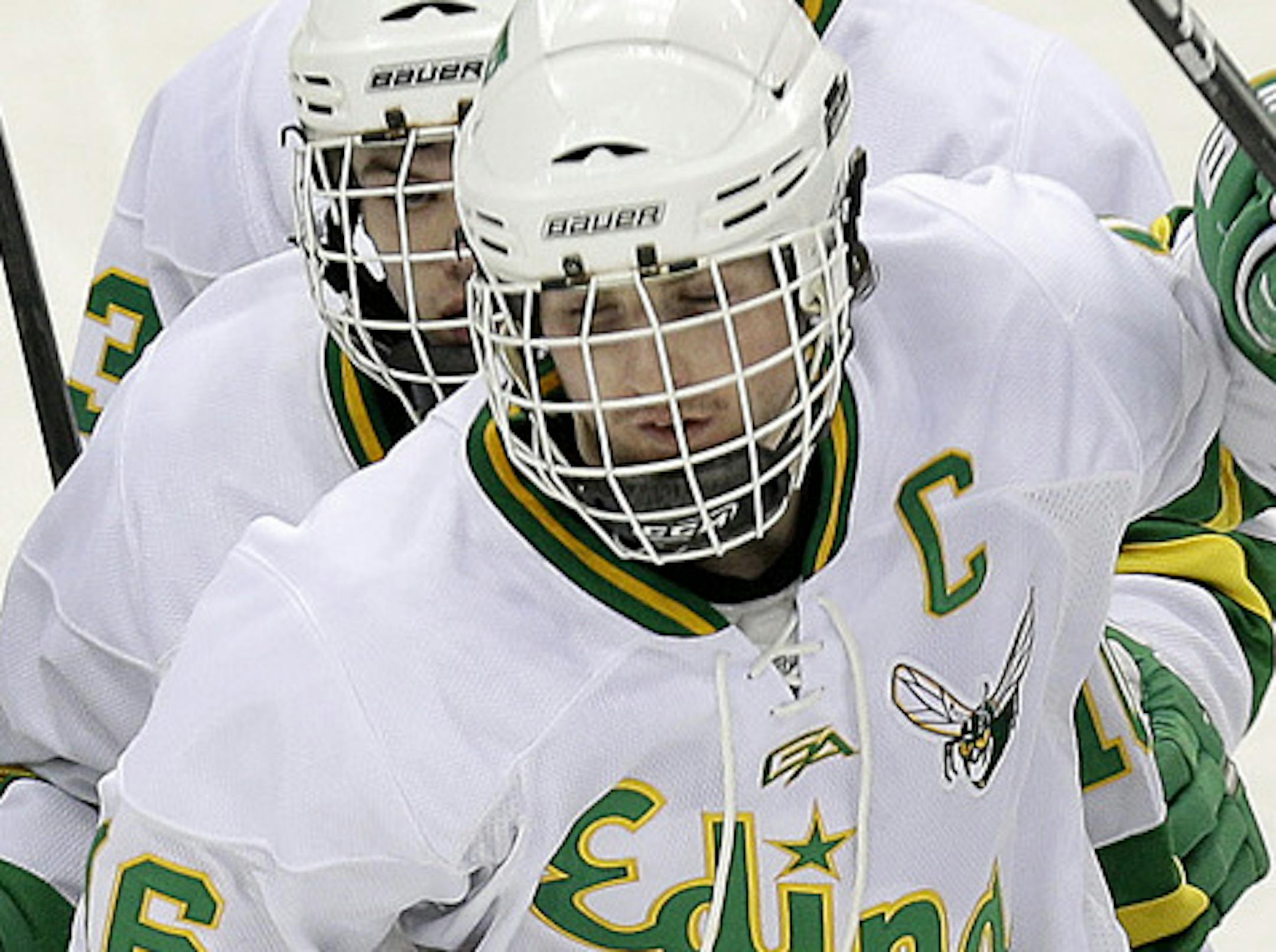 Edina's Connor Hurley is greeted by his teammates after making his first goal in the first period during the Class 2A boys' hockey state tournament quarterfinals at the Xcel Energy Center, Thursday, March 7, 2013 in St. Paul, MN.(ELIZABETH FLORES/STAR TRIBUNE) ELIZABETH FLORES • eflores@startribune.com ORG XMIT: MIN1303071747453252