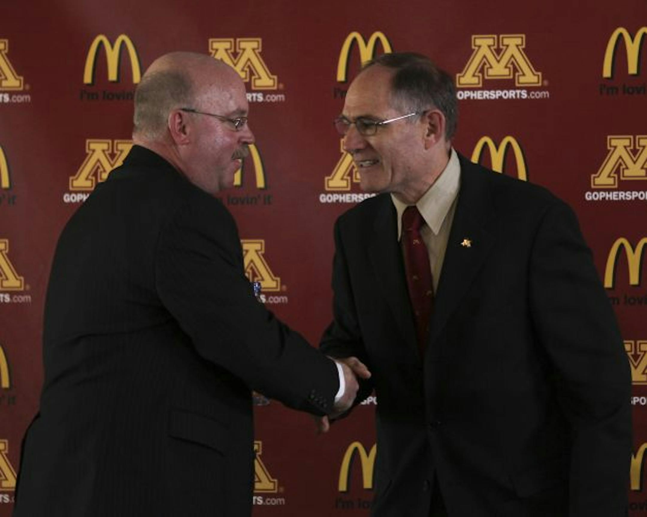 Jerry Kill and Joel Maturi
