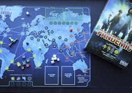 The Pandemic board game was created by Matt Leacock, published by Z-Man Games. Players work together to stop the spread of an infectious disease aroun