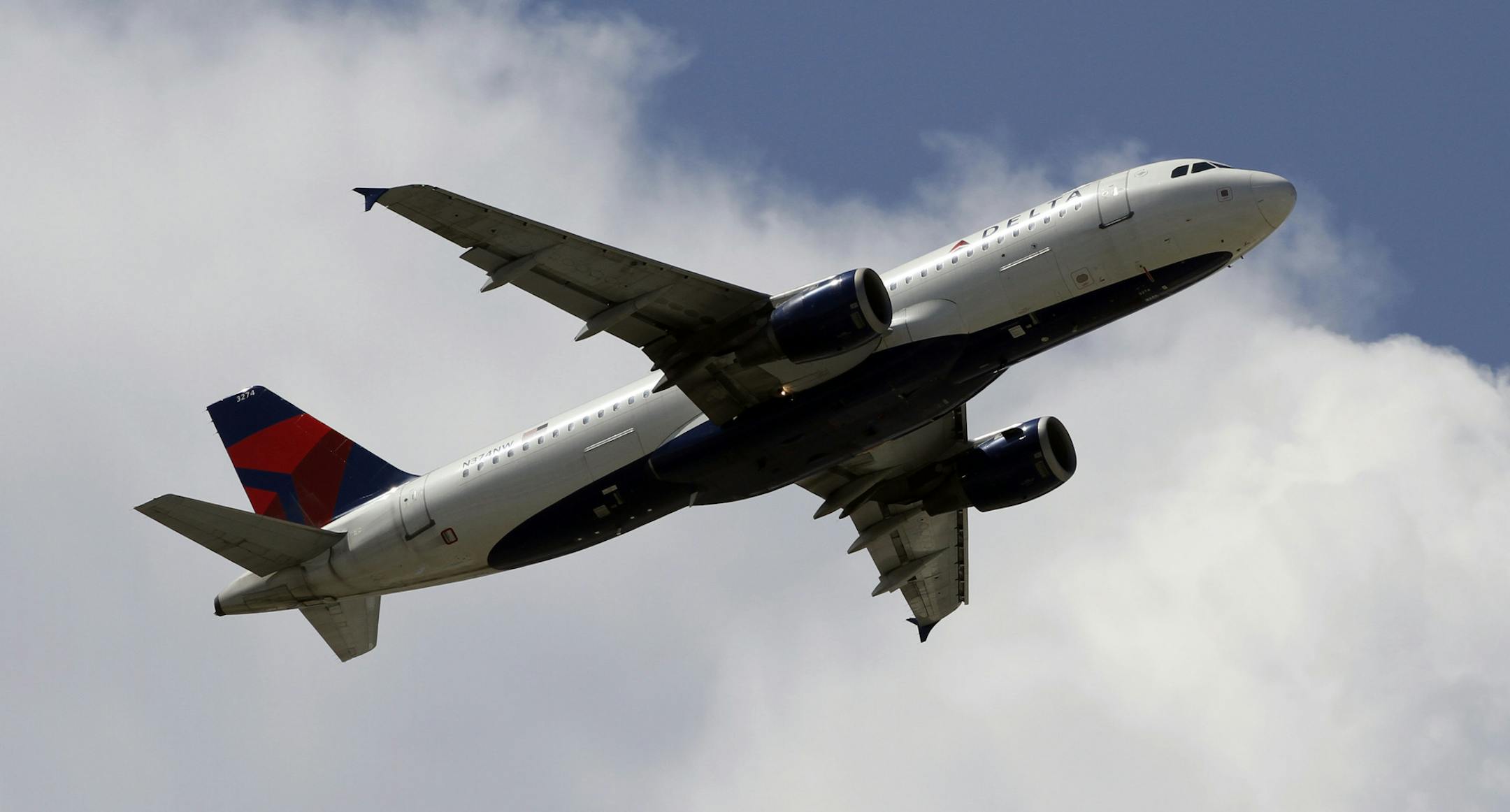FILE - In this Monday, Aug. 20, 2012, file photo, a Delta Air Lines aircraft takes off at Miami International Airport in Miami. Delta Air Lines made more than a billion dollars in the third quarter, Delta reported Tuesday, Oct. 22, 2013. Even its new oil refinery turned a small profit. (AP Photo/Alan Diaz, File)