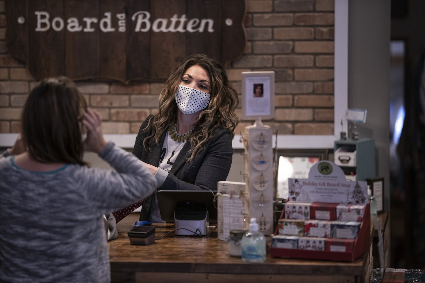 Mary Fritz, owner of Board and Batten, at her Lakeville store. "This holiday season will be the difference of us staying in business or not," she said.