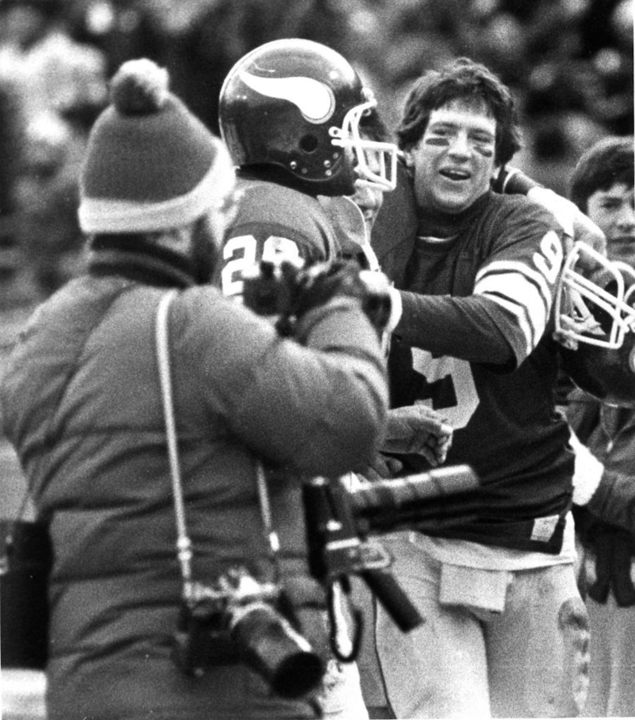 Credit: Star Tribune file photo, Duane Braley Caption: Vikings quarterback Tommy Kramer embraced wide receiver Ahmad Rashad after the two hooked up for the winning touchdown against Cleveland at Met Stadium in Bloomington on Dec. 14, 1980.