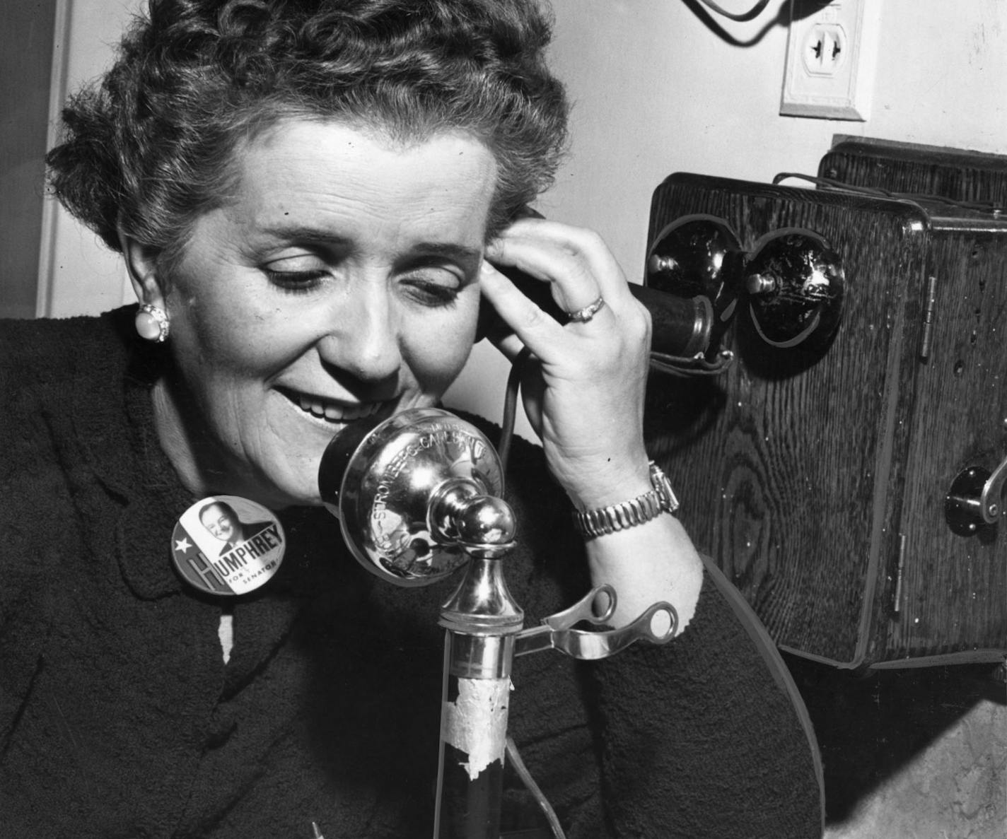 Coya Knutson (DFL), answers the phone in her Oklee, Minn. home after beating Rep. Harold Hagen (R) in an election for Minnesota's Ninth District seat in Congress in 1954. With the victory, Knutson became the first woman elected to Congress from Minnesota. Minneapolis Tribune phot by Marty Nordstrom.