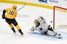 Early, late goals in second period by Predators haunt Wild in loss