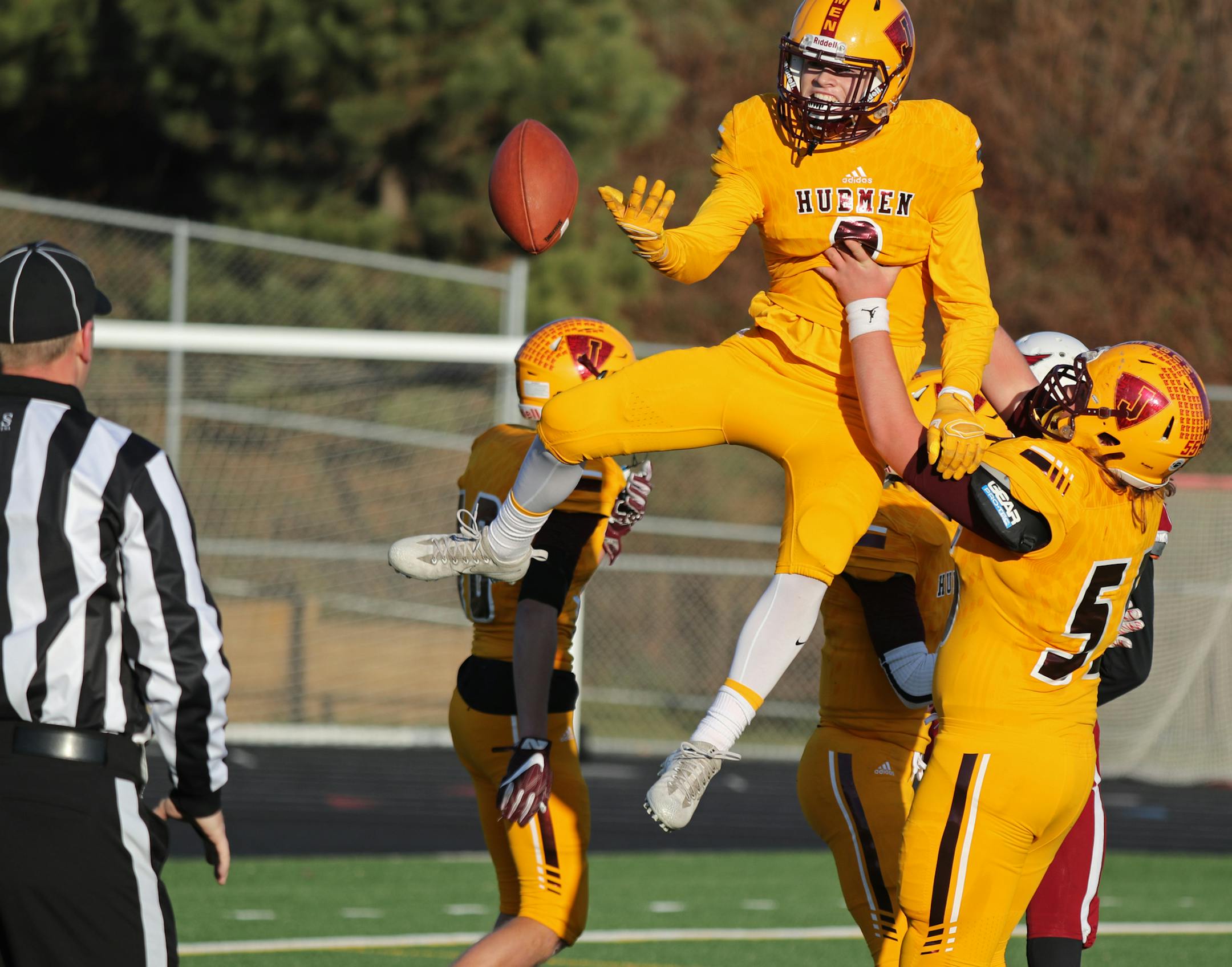 Jordan's Adam Kreuser tosses the ball to the ref while celebrating with his teammates after scoring a touchdown in the first half. ] Shari L. Gross ï shari.gross@startribune.com Class 3A, Fairmont vs. Jordan football action on Saturday, Nov. 11, 2017 at Prior Lake High School in Savage, Minn.