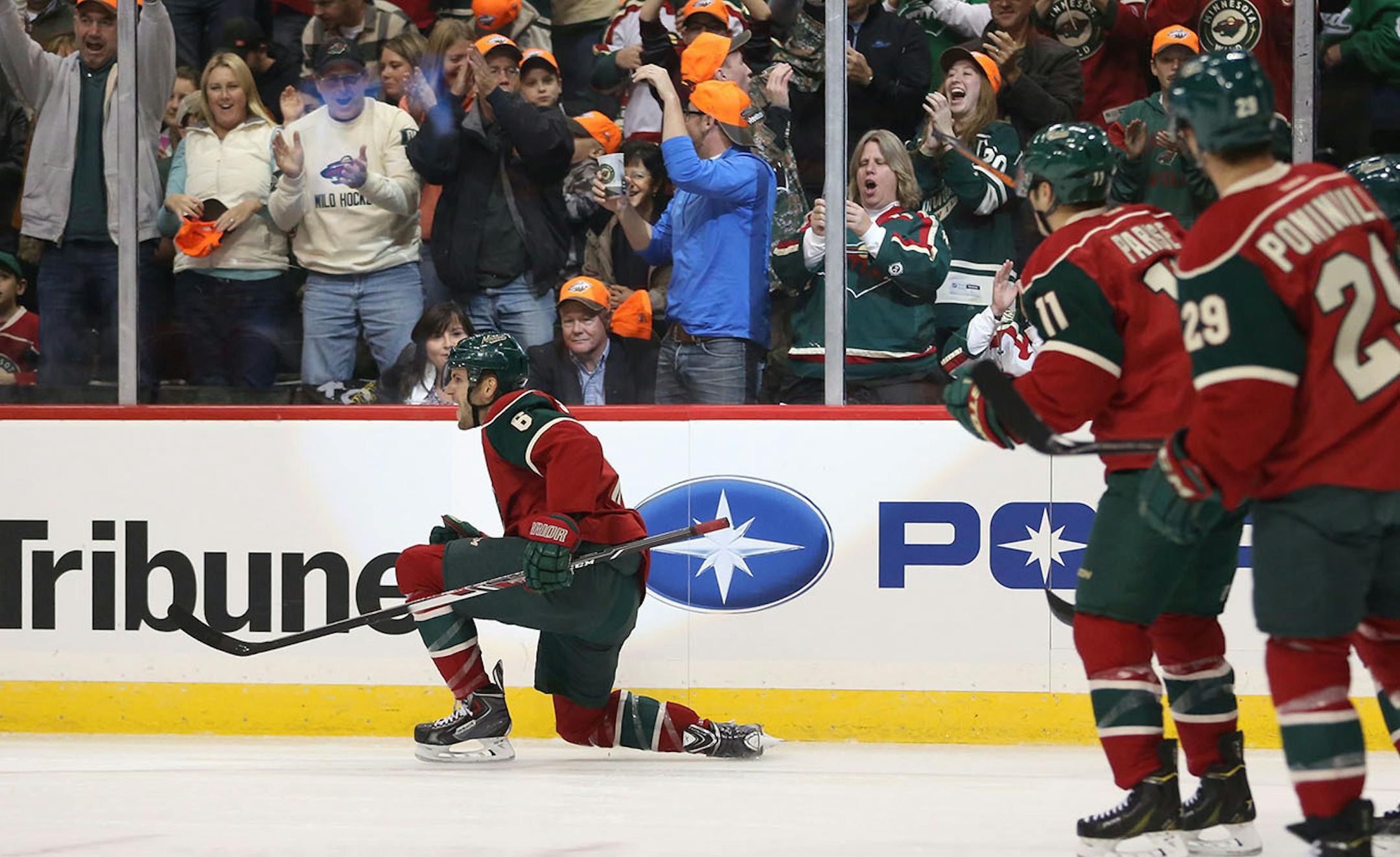 Wild's Marco Scandella celebrated scoring the first goal during the first period. ] (KYNDELL HARKNESS/STAR TRIBUNE) kyndell.harkness@startribune.com The Wild vs the Lighting at the Xcel Energy Center in St. Paul Min., Saturday, October 25, 2014.