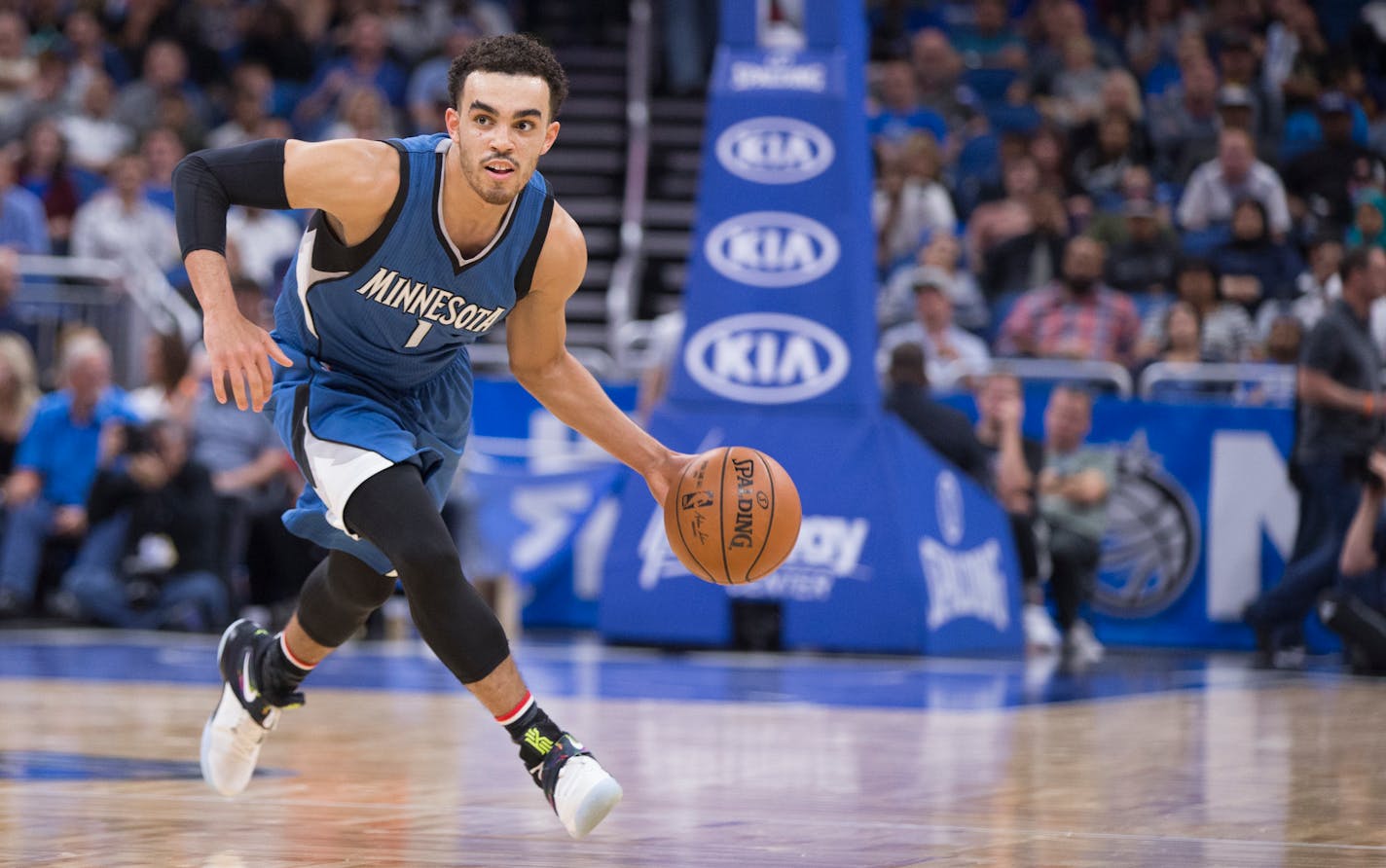 Minnesota Timberwolves guard Tyus Jones (1) dribbles down court during the first half of an NBA basketball game against the Orlando Magic in Orlando, Fla., Wednesday, Nov. 9, 2016. (AP Photo/Willie J. Allen Jr.)