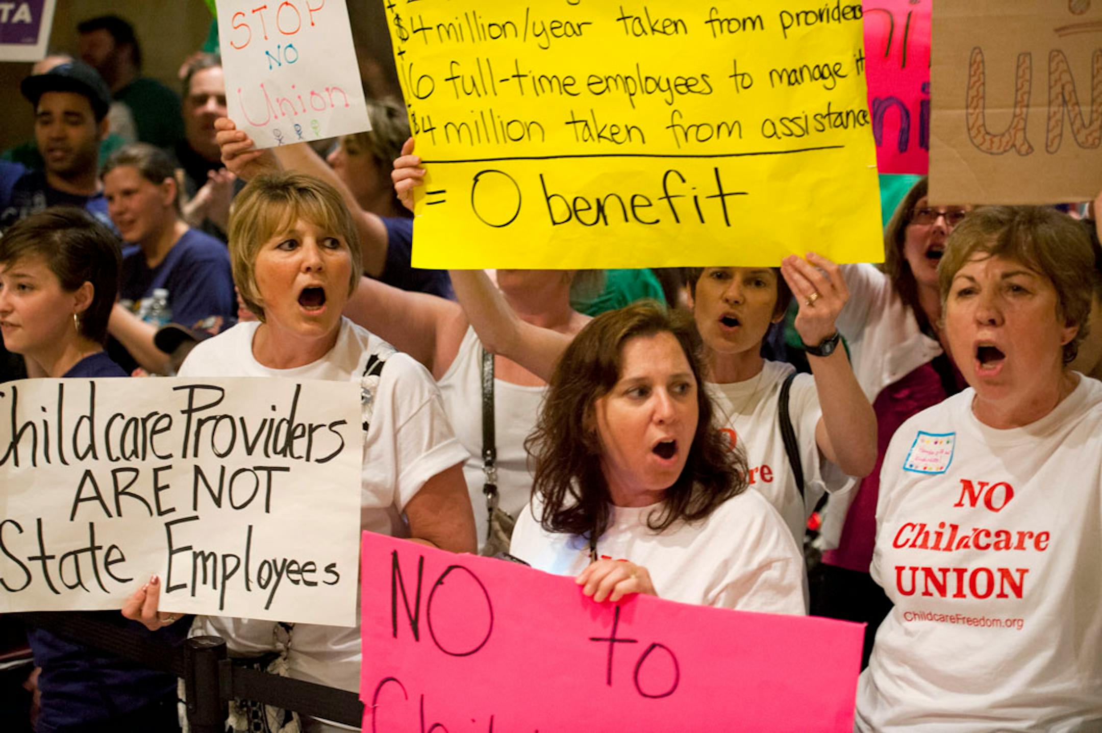 Outside the House chamber while the daycare unionization debate was raging inside, AFSCME and SEIU members sang Solidarity Forever while opponents of the bill chanted Vote No, Vote No. Sunday, May 19, 2013.