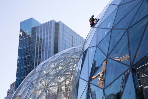 FILE -- Large spheres in front of Amazon's building in Seattle, Sept. 27, 2017. Amazon said in October it had received proposals from 238 cities and r