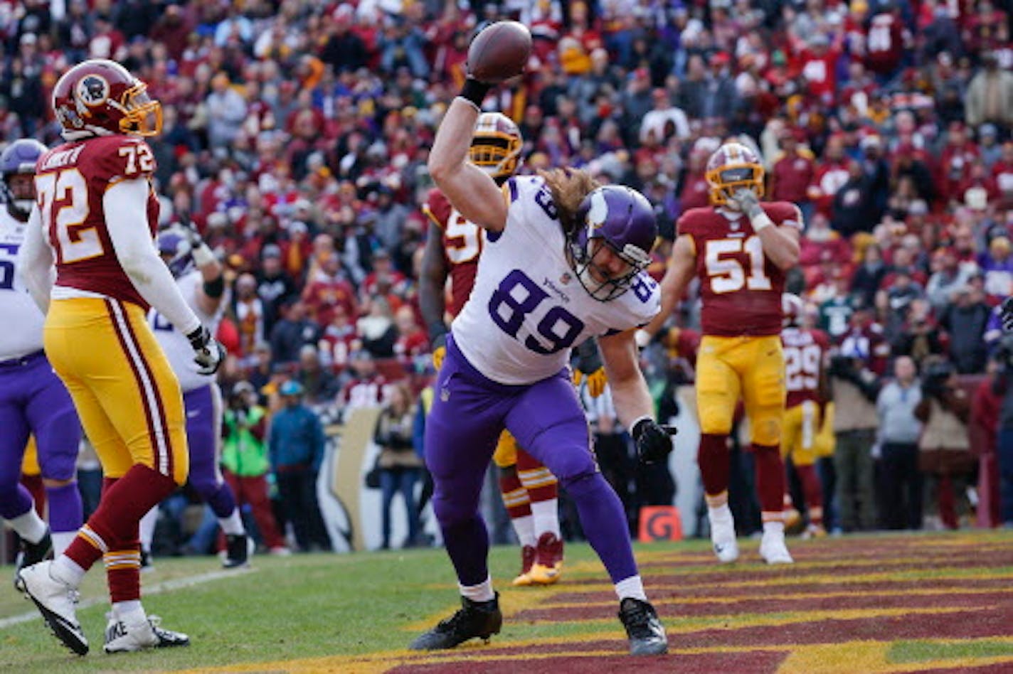 Minnesota Vikings tight end David Morgan (89) celebrates his touchdown during the first half of an NFL football game against the Washington Redskins in Landover, Md., Sunday, Nov. 12, 2017. (AP Photo/Alex Brandon)