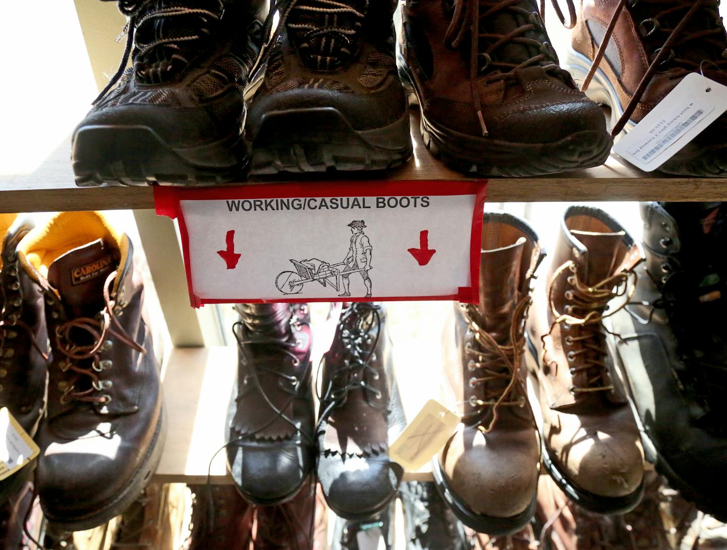 Used boots at Repair Lair, Nancy Ford's Minneapolis consignment shop specializing in outdoor clothing, accessories and repair and seen Saturday, April 1, 2017, in Minneapolis, MN.] DAVID JOLES &#xef; david.joles@startribune.com Repair Lair in Minnepaolis is the latest consignment shop with a speciality--outdoor clothing, accessories and repair.**Nancy Ford,cq