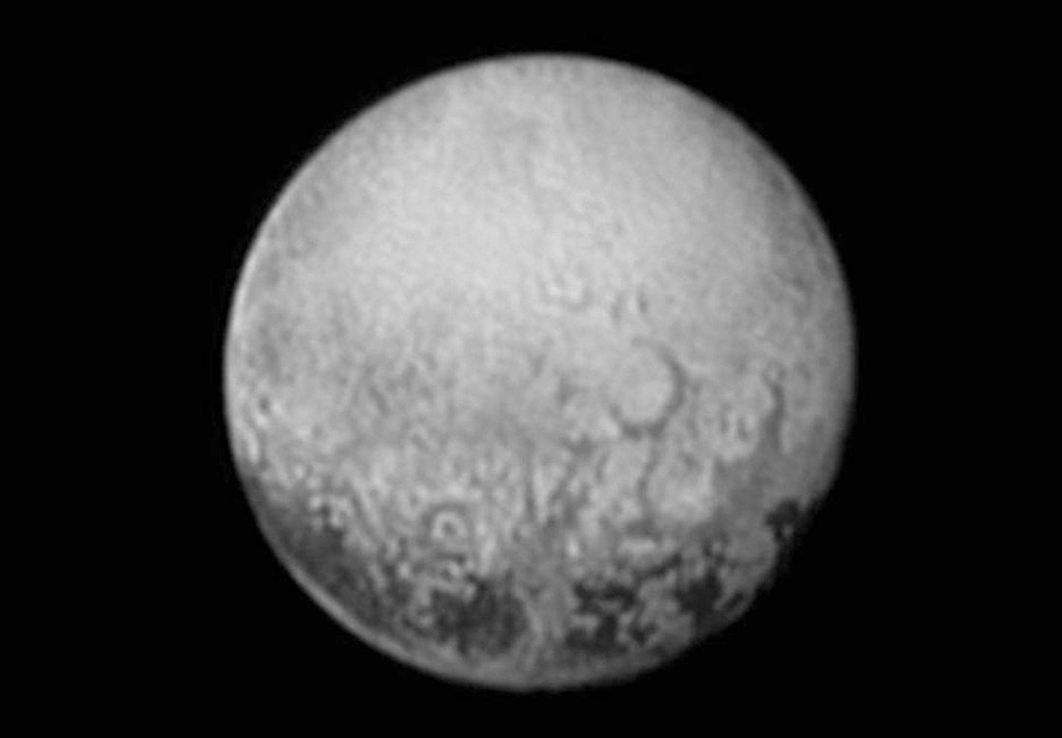 This July 11, 2015, image provided by NASA shows Pluto from the New Horizons spacecraft. On Tuesday, July 14, NASA's New Horizons spacecraft will come closest to Pluto. New Horizons has traveled 3 billion miles over 9½ years to get to the historic point. (NASA/JHUAPL/SWRI via AP)