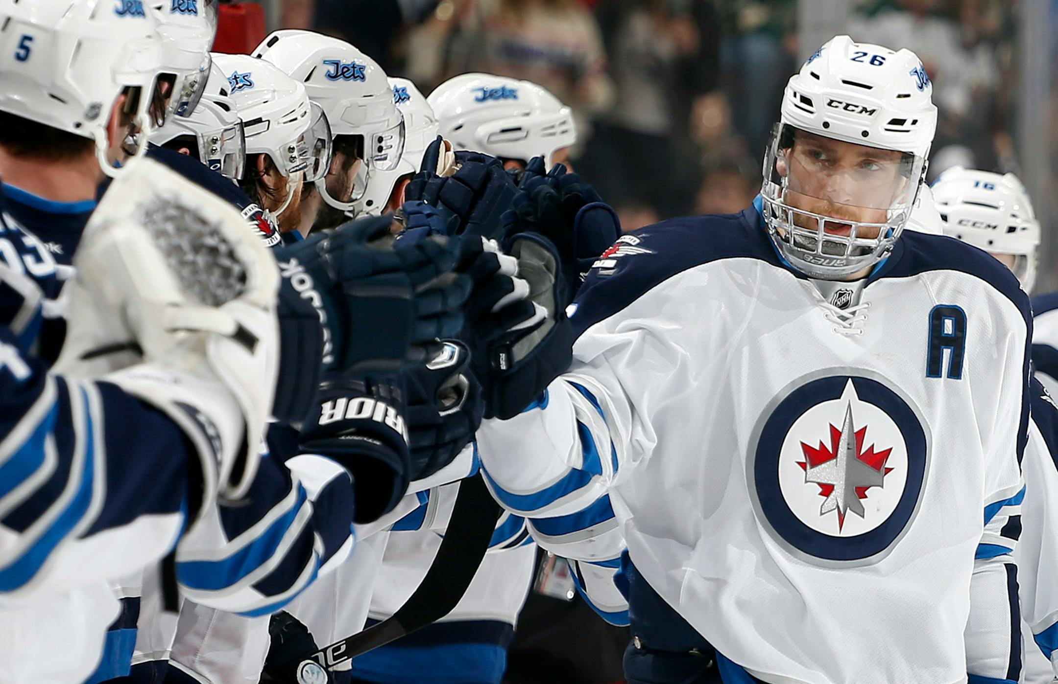 Blake Wheeler (26) celebrated with the bench after scoring a goal in the first period. ] CARLOS GONZALEZ cgonzalez@startribune.com, April 6, 2015, St. Paul, Minn., Xcel Energy Center, NHL, Minnesota Wild vs. Winnipeg Jets
