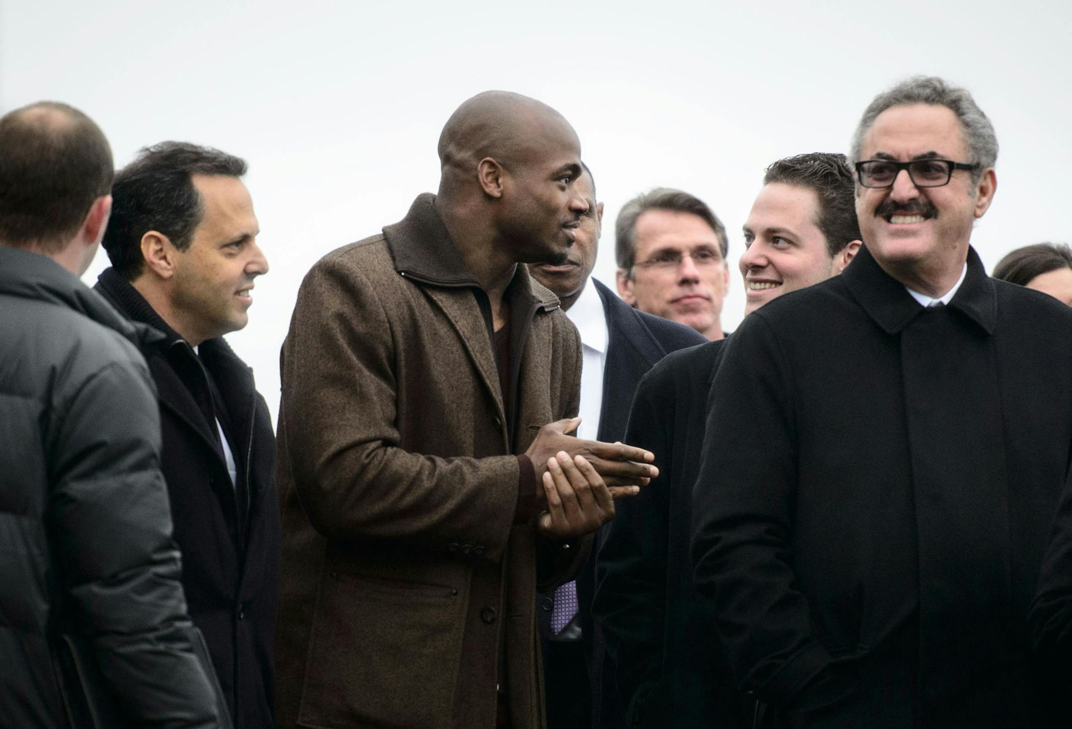 Minnesota Vikings running back Adrian Peterson and owner Zygi Wilf during the ceremonial groundbreaking for the new, billion-dollar Vikings stadium.