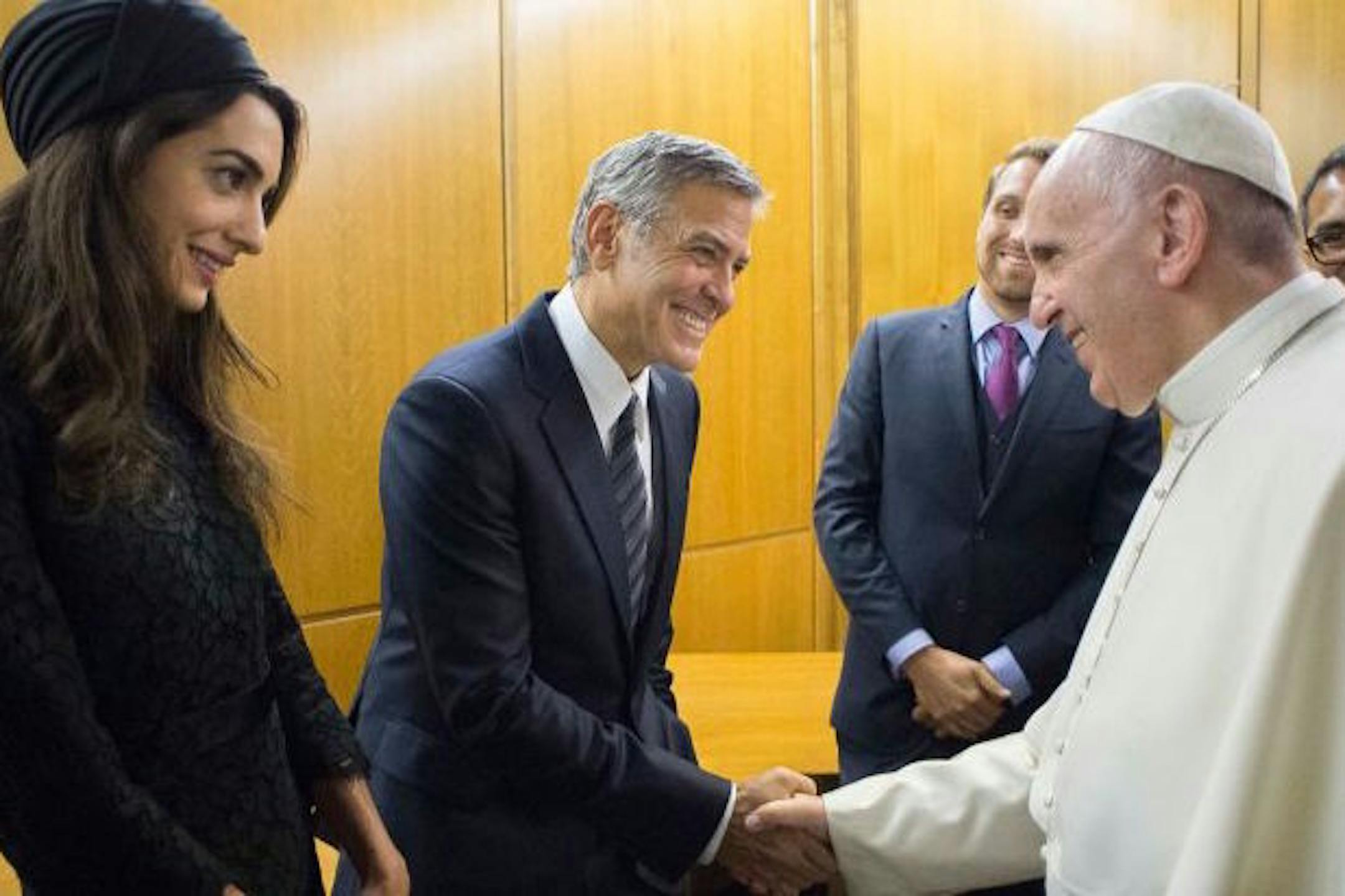 George and Amal Clooney meet Pope Francis on Sunday May 29, 2016