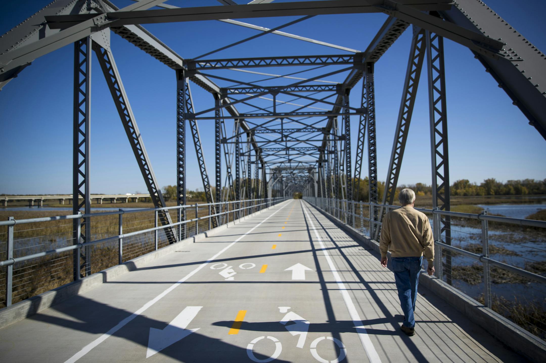 Marty Becker went for a walk to watch the birds in the water on the old Cedar Avenue bridge on Thursday, October 13, 2016, in Bloomington, Minn. Becker grew up fishing on the bridge when it was the main road over the Minnesota River. ] RENEE JONES SCHNEIDER • renee.jones@startribune.com