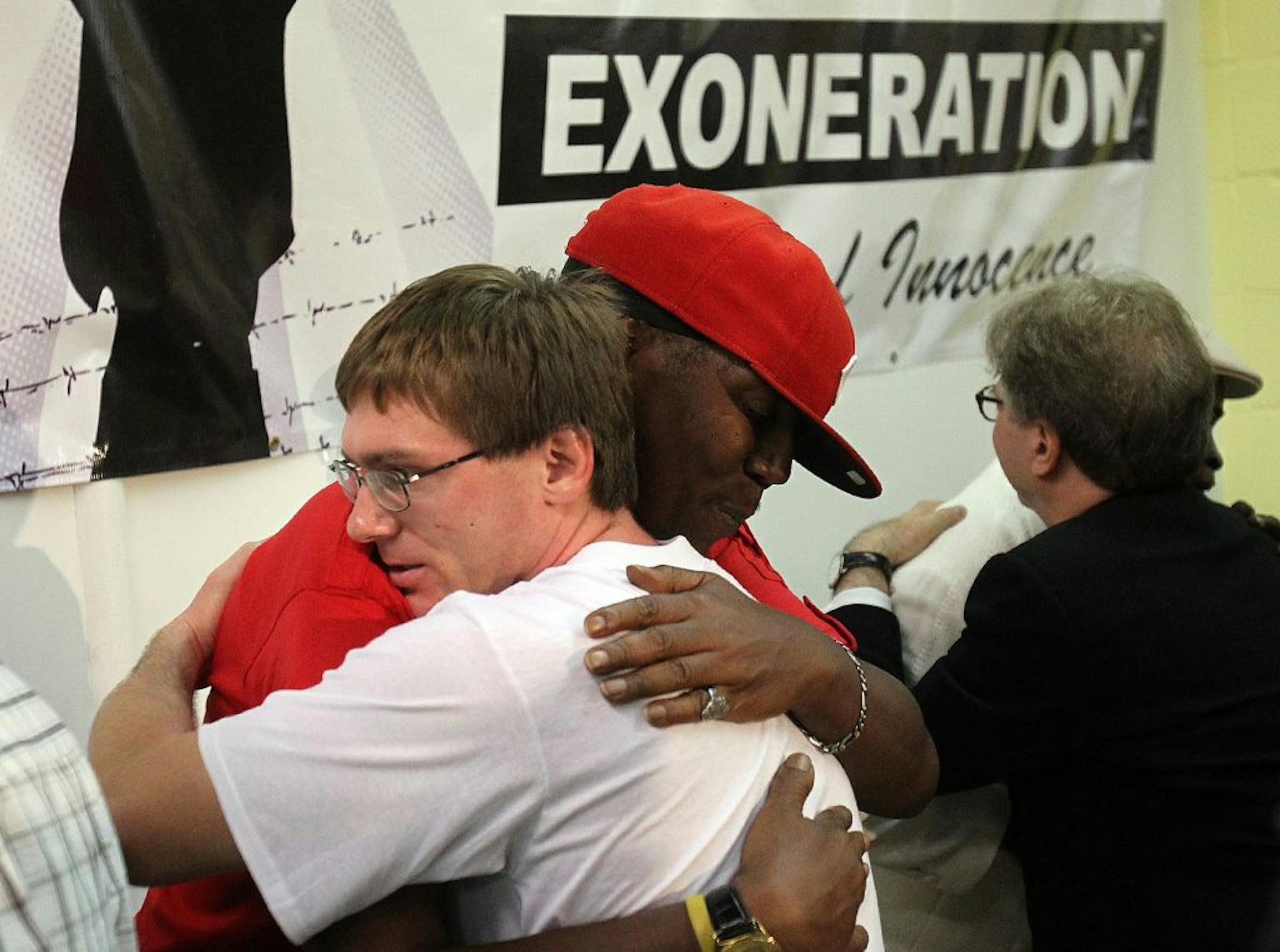 Damon Thibodeaux is embraced by Derrick James, himself a former death row inmate, following a press conference in New Orleans.