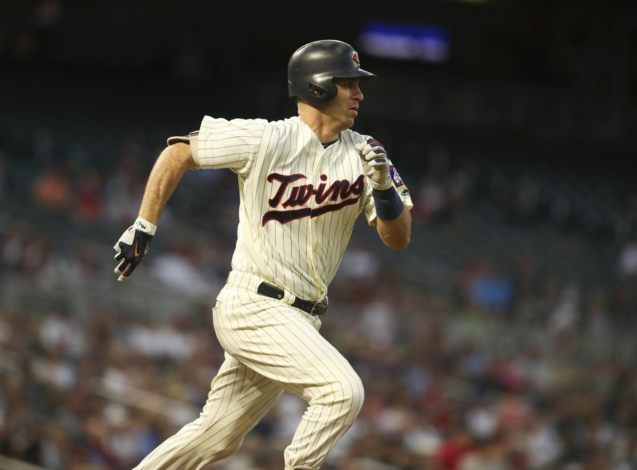 Minnesota Twins first baseman Joe Mauer ran to first after hitting a single in the first inning against the Yankees.