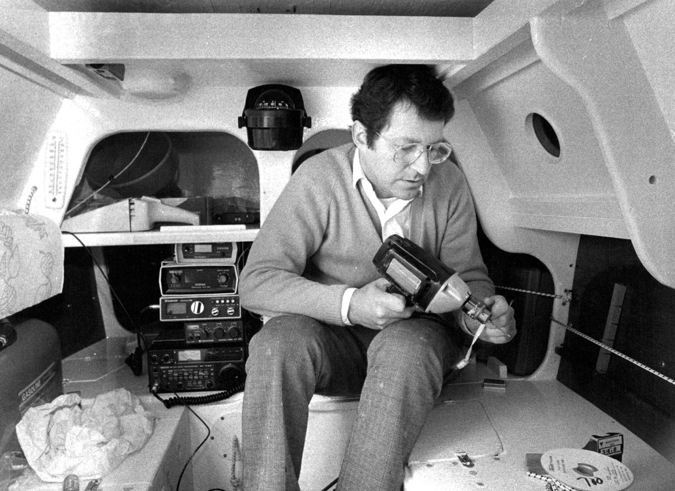 Gerry Spiess shows the tight quarters inside the boat.