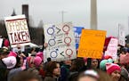 Marchers walked past rhe Lincoln memorial at the Women's March in Washington in Washington D.C., on Saturday, January 21, 2017. ] RENEE JONES SCHNEIDE
