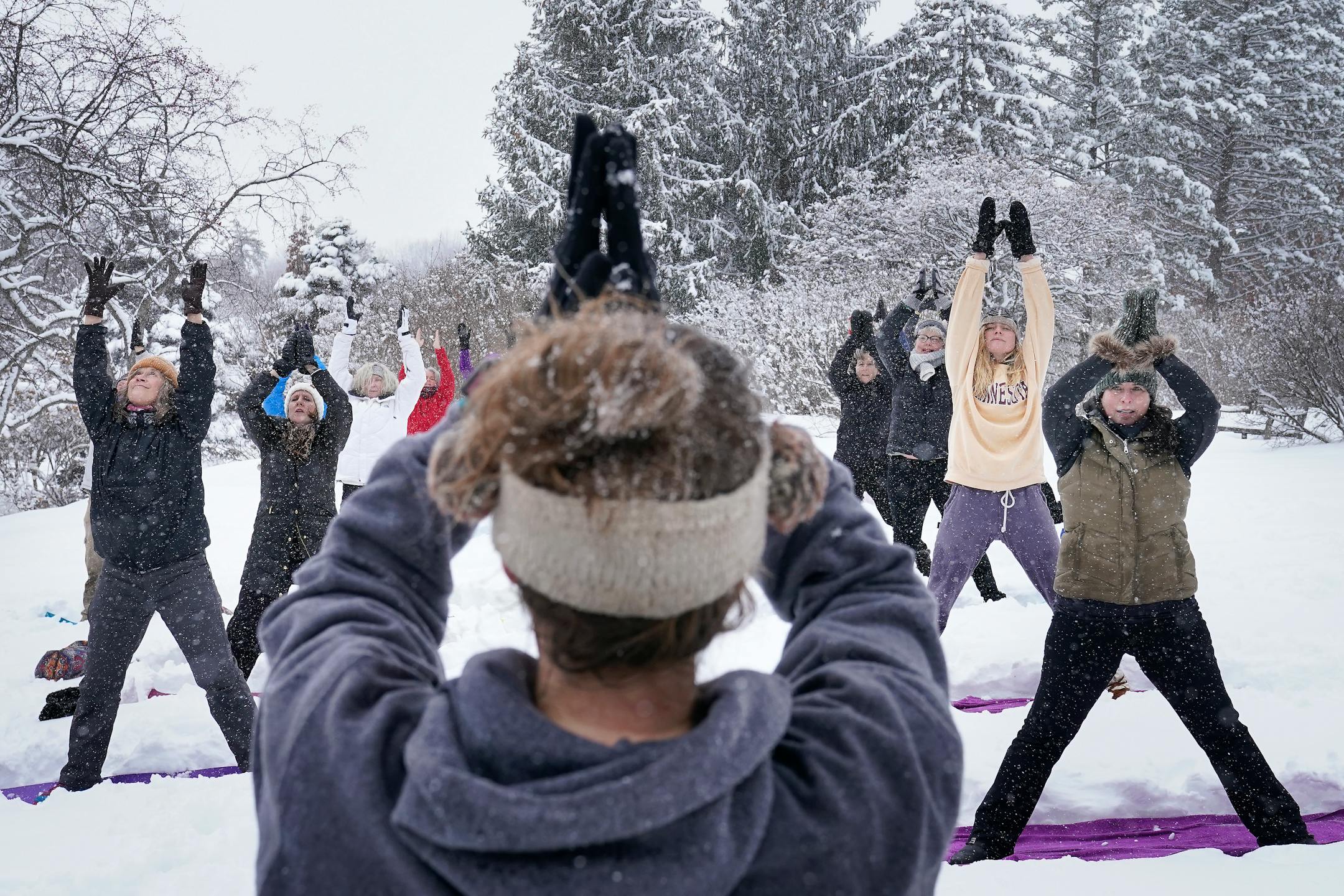 As part of the Yoga in the Gardens series, instructor Jenn Holm of Yoga 4 You, led participants in Snowga at the Lilac Walk in the Minnesota Landscape Arboretum Thursday, Jan. 19, 2023 in Chaska, Minn. The next opportunity for Snowga at is Feb. 26.