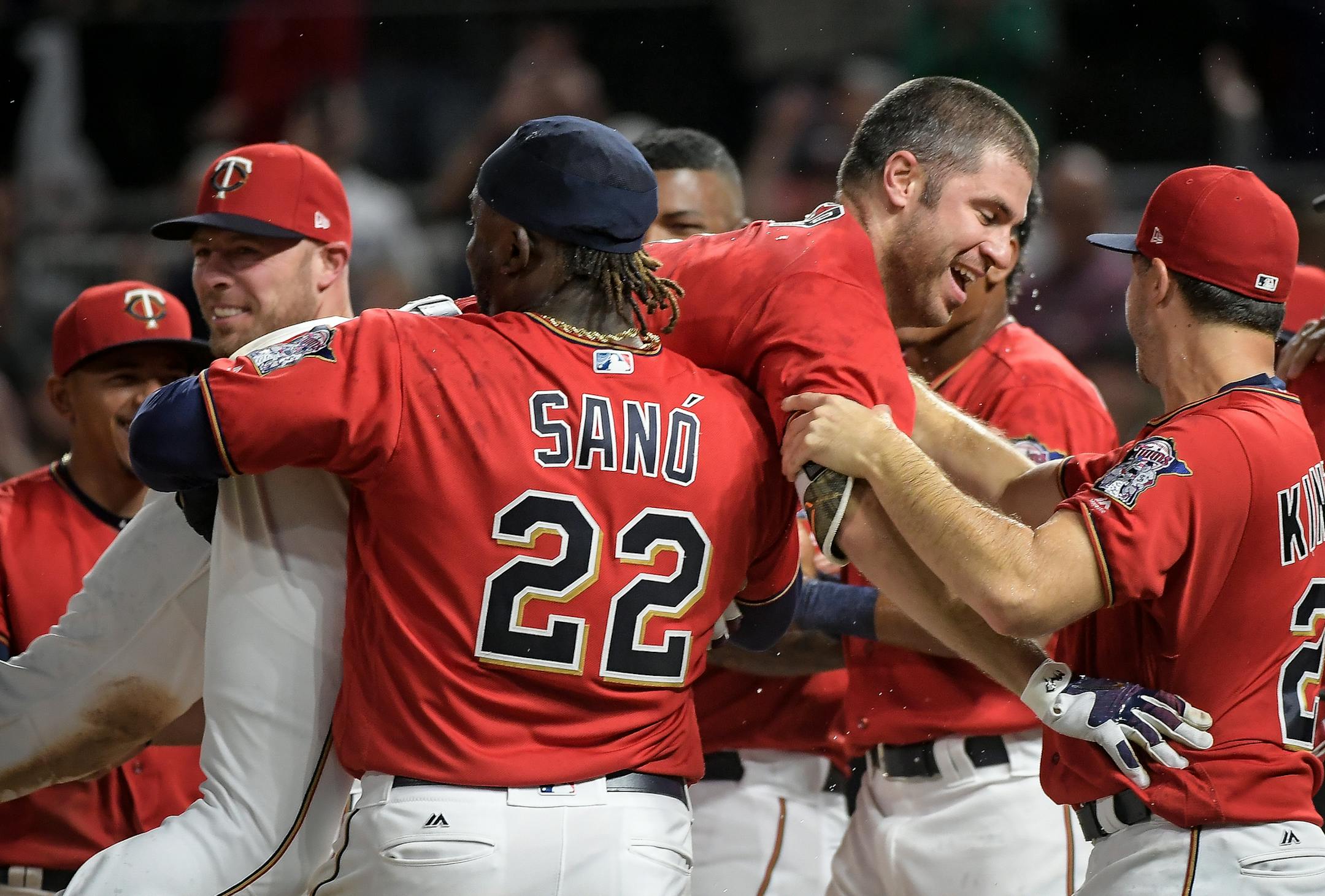 Minnesota Twins third baseman Miguel Sano (22) lifted first baseman Joe Mauer up on his shoulder after Mauer hit a walk off homerun in the bottom of the ninth inning Friday. ] AARON LAVINSKY &#xef; aaron.lavinsky@startribune.com The Minnesota Twins played the Boston Red Sox on Friday, May 5, 2017 at Target Field in Minneapolis, Minn.
