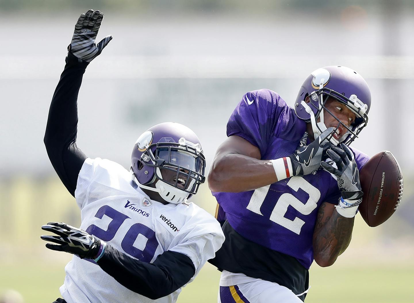 Xavier Rhodes (29) broke up a pass intended for Charles Johnson (12).