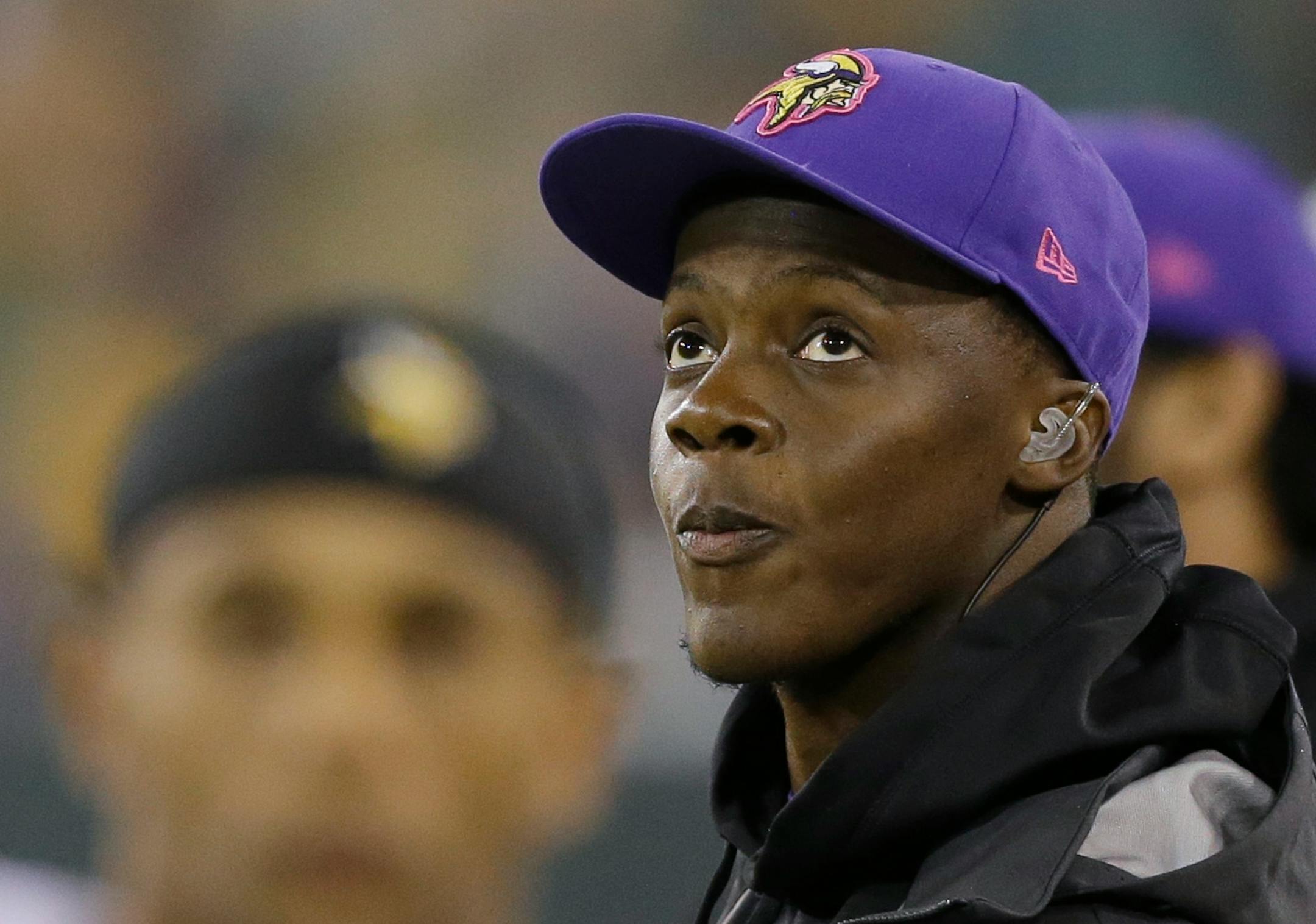 Minnesota Vikings' Teddy Bridgewater on the sidelines during the second half of an NFL football game against the Green Bay Packers Thursday, Oct. 2, 2014, in Green Bay, Wis. (AP Photo/Tom Lynn)