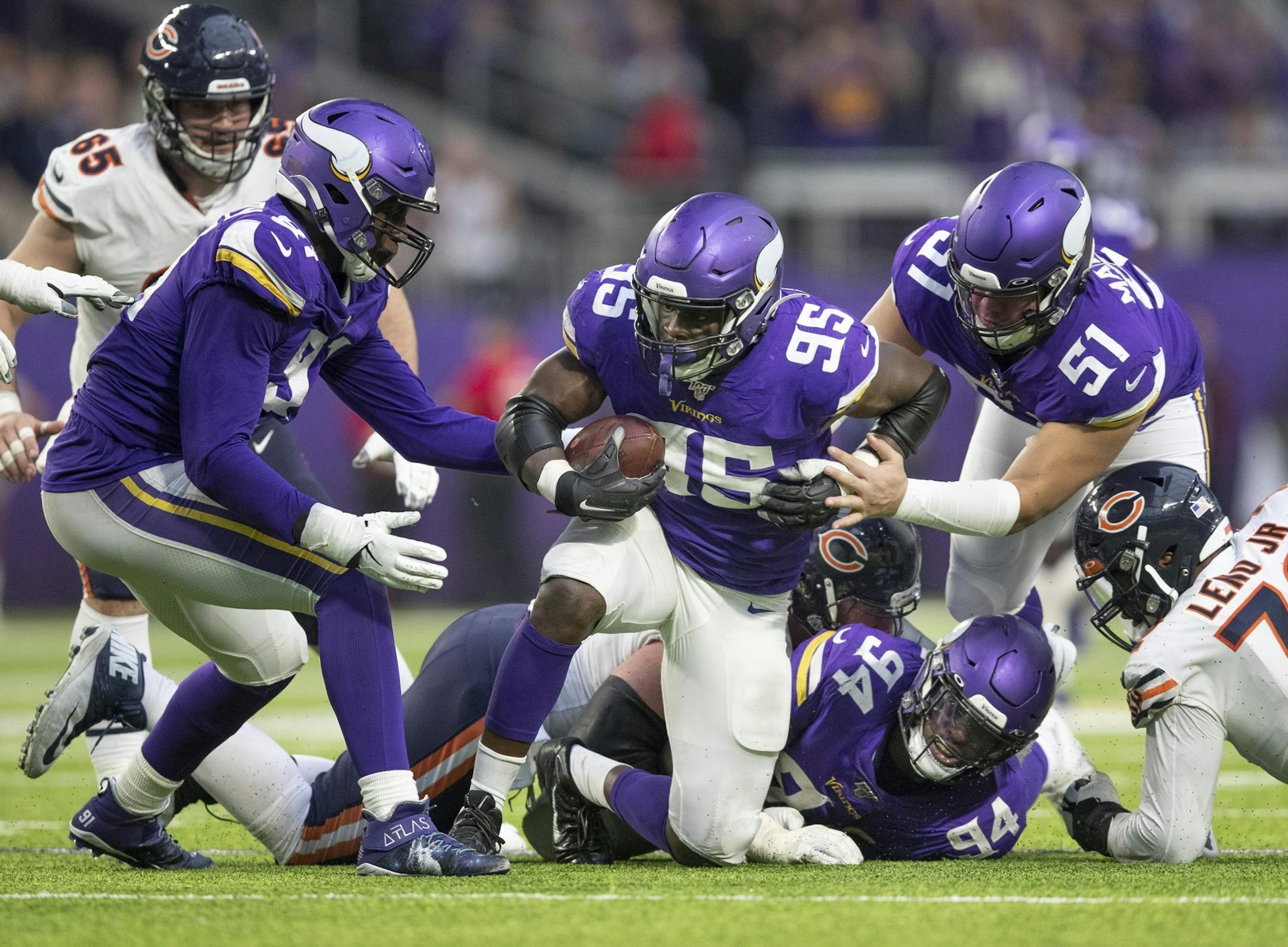 Minnesota Vikings defensive end Ifeadi Odenigbo (95) recovered a Chicago Bears quarterback Mitchell Trubisky (10) in the fourth quarter .