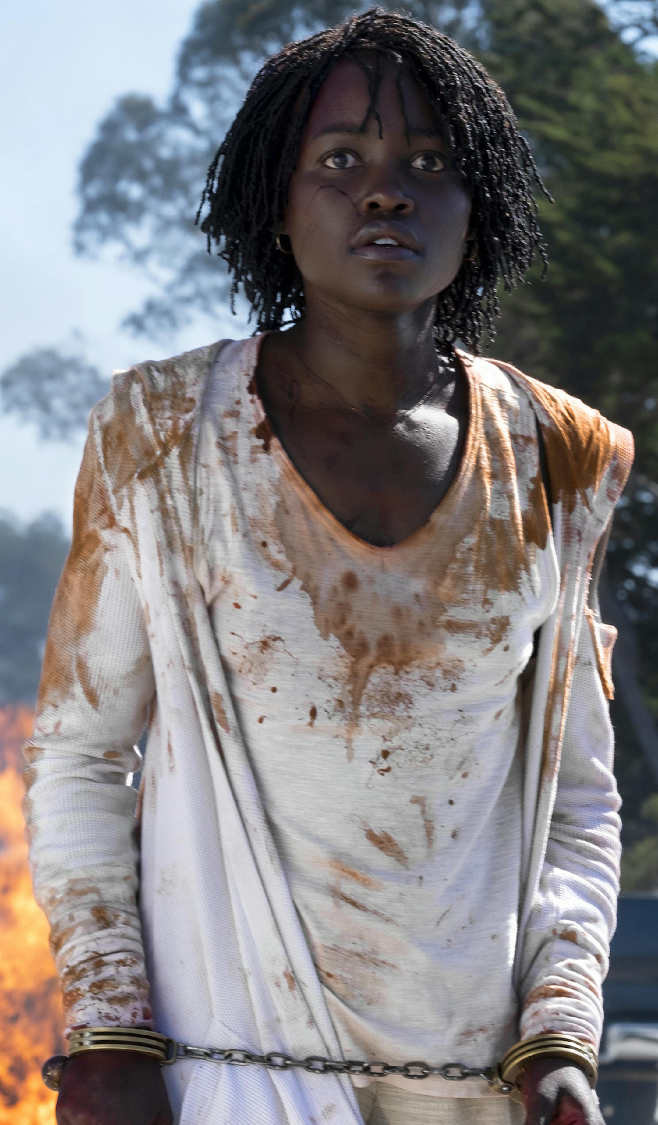 This image released by Universal Pictures shows Lupita Nyong'o in a scene from "Us," written, produced and directed by Jordan Peele. (Claudette Barius/Universal Pictures via AP)