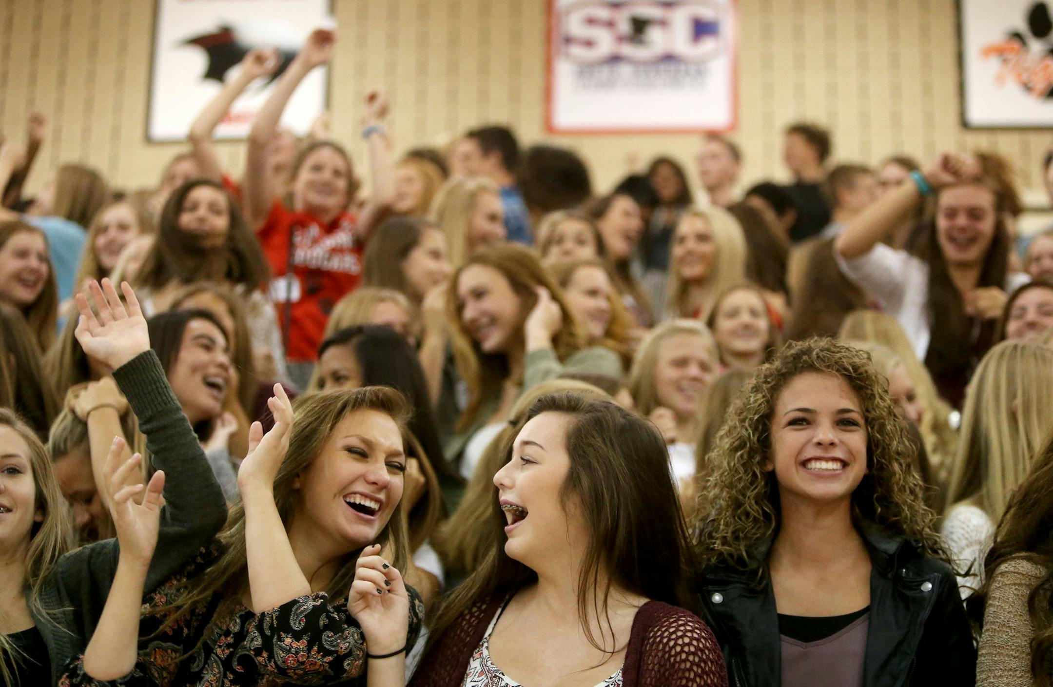 Freshman Haley Martinson, front, left to right, Madi Wheeler, and Grace Ashton join in some bleacher dancing during Pepfest for incoming freshmen in the gym at Lakeville South High Thursday, Sept. 20, 2015.](DAVID JOLES/STARTRIBUNE)djoles@startribune.com Pepfest for incoming freshmen in the gym at Lakeville South High.**Haley Martinson, Madi Wheeler, and Grace Ashton,cq