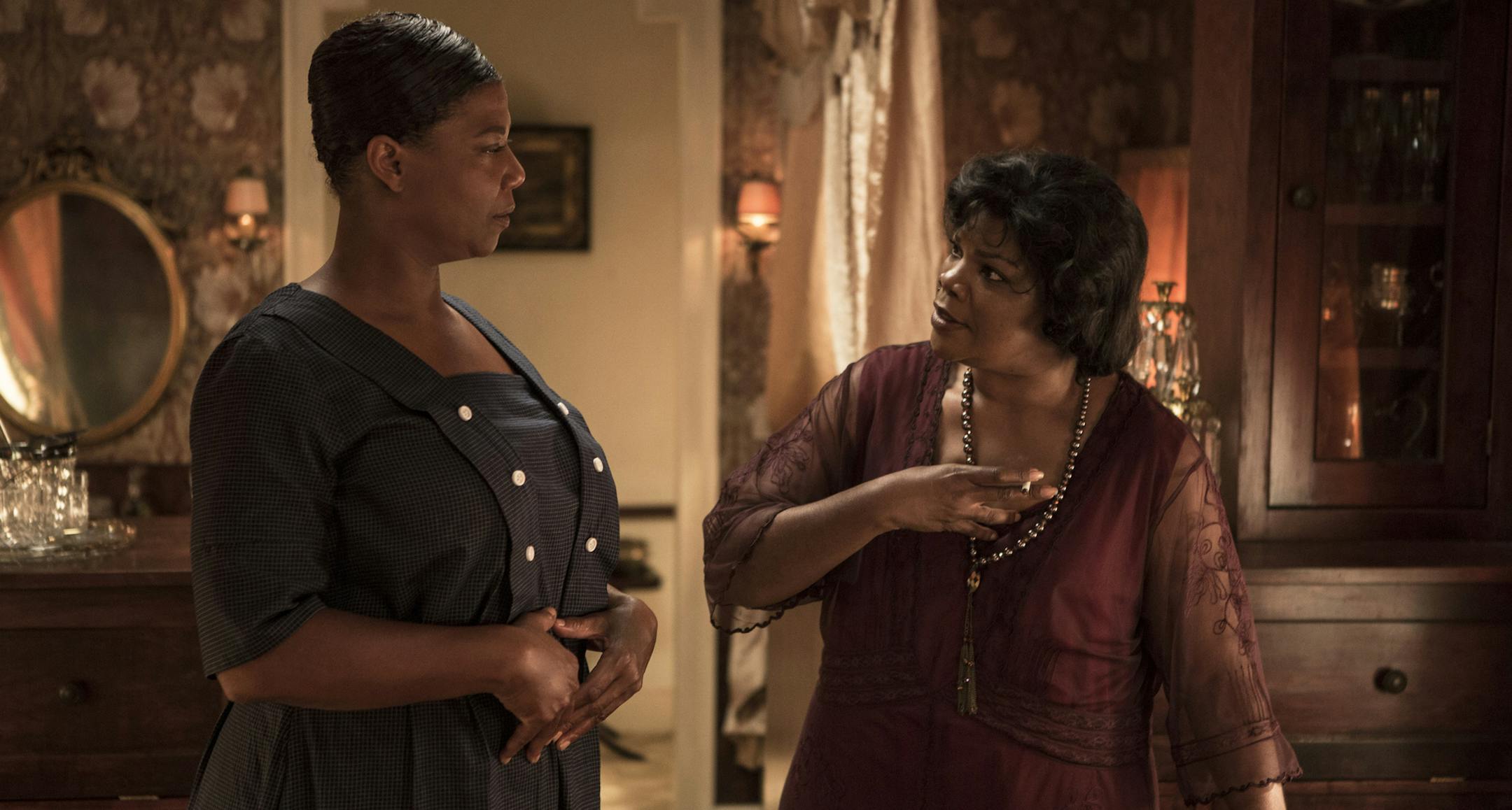 This photo provided by HBO shows Queen Latifah, left, as Bessie Smith, and Mo&#xed;Nique as Ma Rainey, in the HBO film, "Bessie." (AP Photo/HBO, Frank Masi)