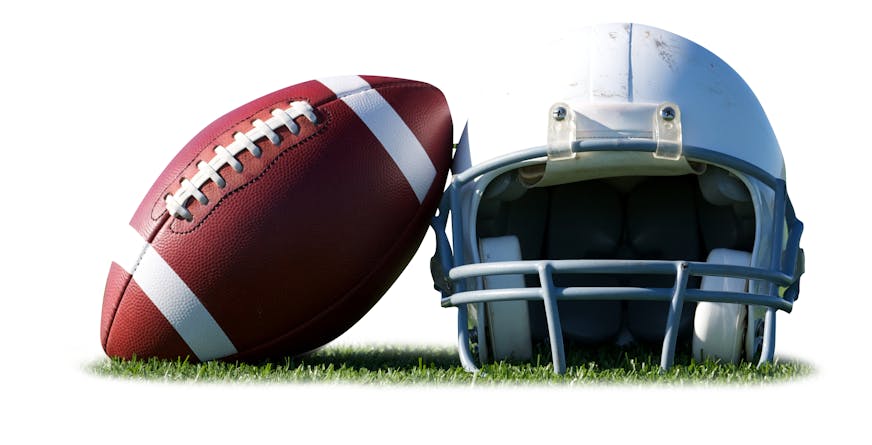 American Football and Helmet on the Field