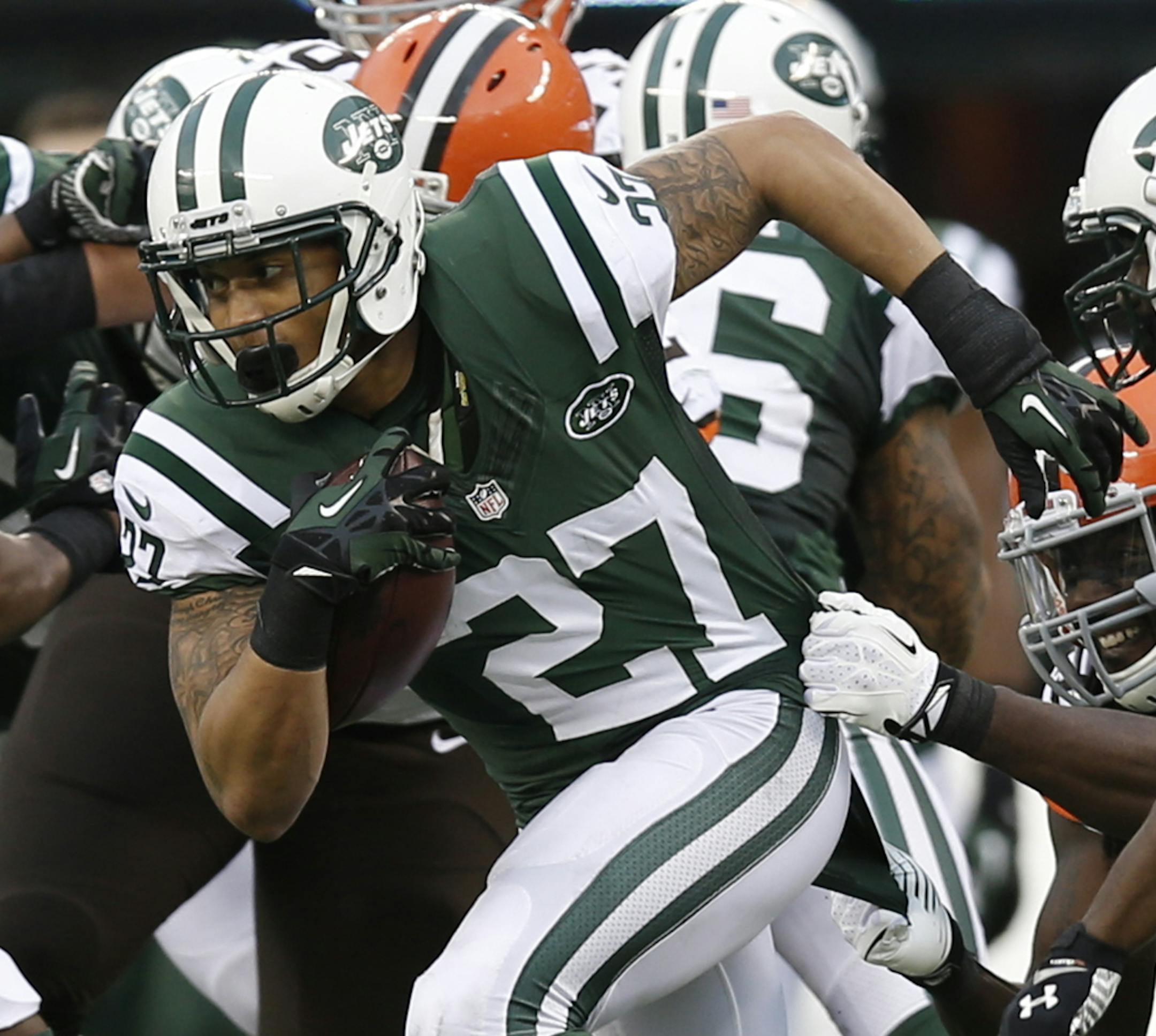 New York Jets cornerback Dee Milliner (27) runs back an interception during the second half of an NFL football game against the Cleveland Browns Sunday, Dec. 22, 2013, in East Rutherford, N.J. (AP Photo/Kathy Willens)