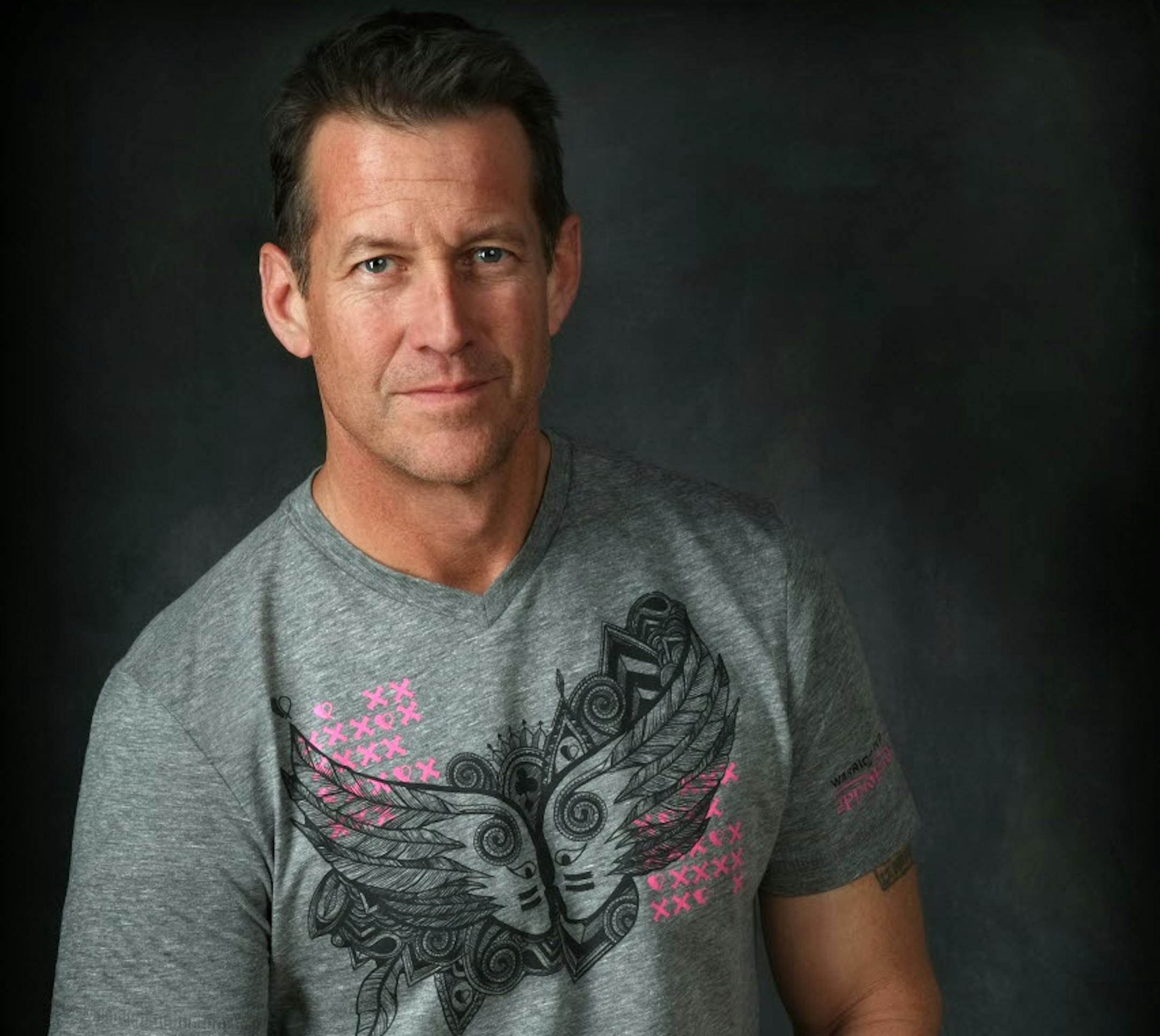 James Denton, who played plumber Mike Delfino on "Desperate Housewives," has moved to the Twin Cities area to support a sister-in-law who is battling breast cancer. The profits from sales of the T-shirt he is wearing will go toward helping cancer patients pay their bills.