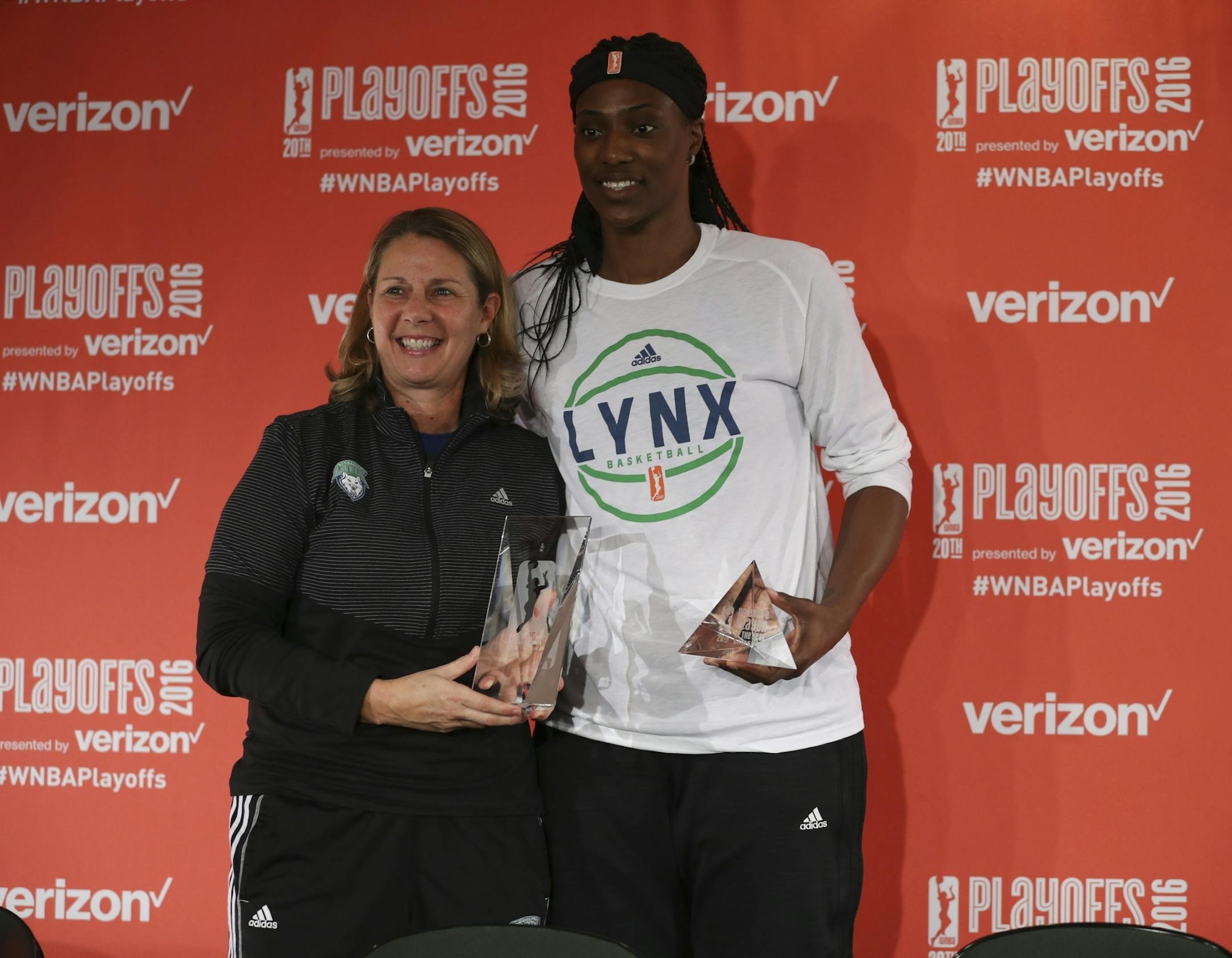 Lynx head coach Cheryl Reeve held her WNBA Coach of the Year trophy with Sylvia Fowles and her Defensive Player of the Year trophy after a news conference before Friday night's game.