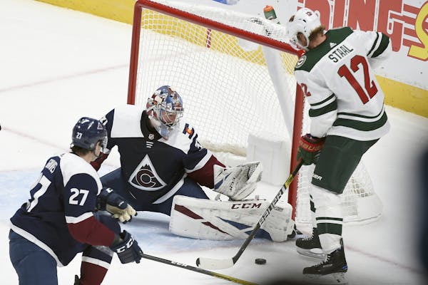 Minnesota Wild center Eric Staal (12) looks to take a shot on Colorado Avalanche goaltender Philipp Grubauer (31) during the third period in an NHL ho