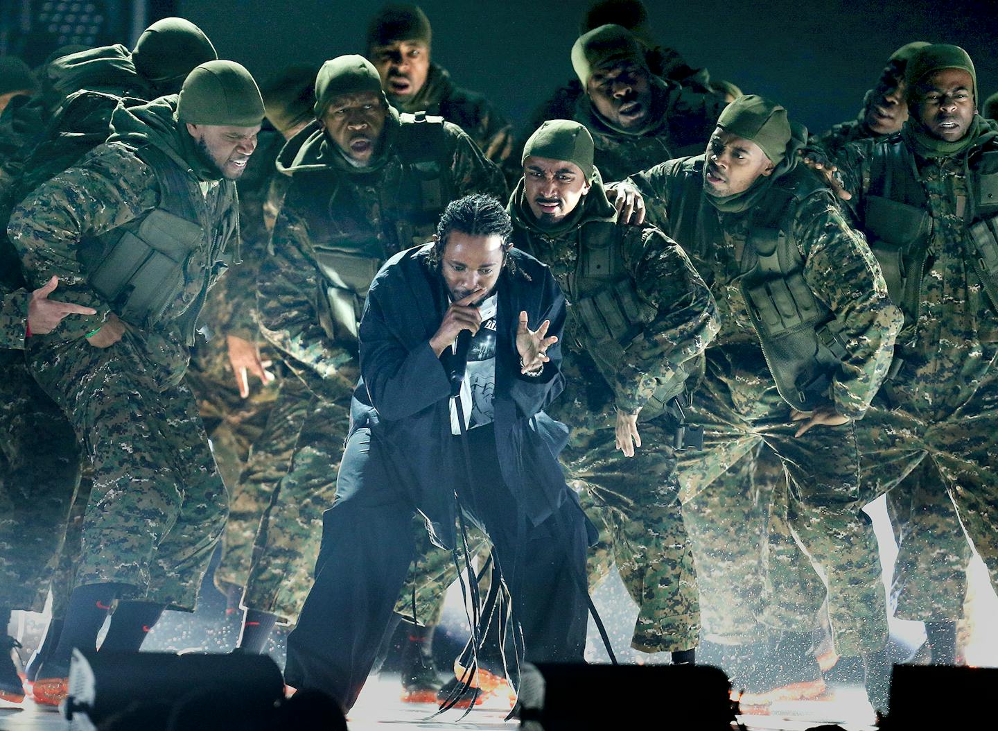 Big winner Kendrick Lamar opened the Grammys with a four-song medley.