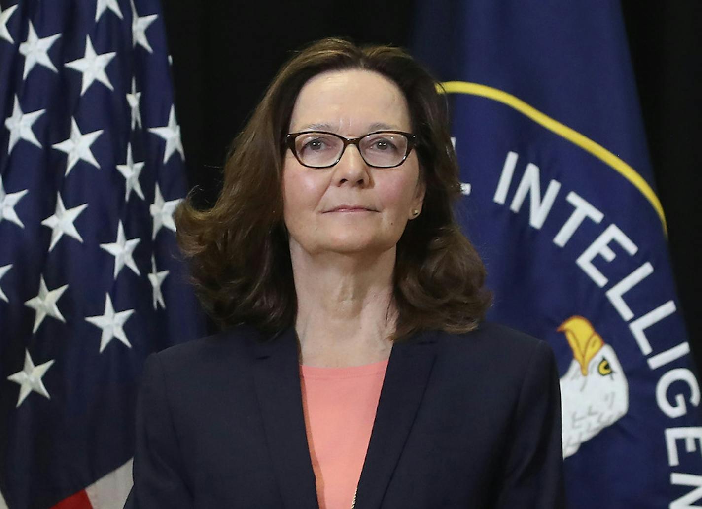 From left, Secretary of State Mike Pompeo, Gina Haspel and President Donald Trump attend the swearing-in ceremony for Haspel as CIA director at agency headquarters, May 21, 2018, in Langley, Va. (Mark Wilson/Sipa USA/TNS)