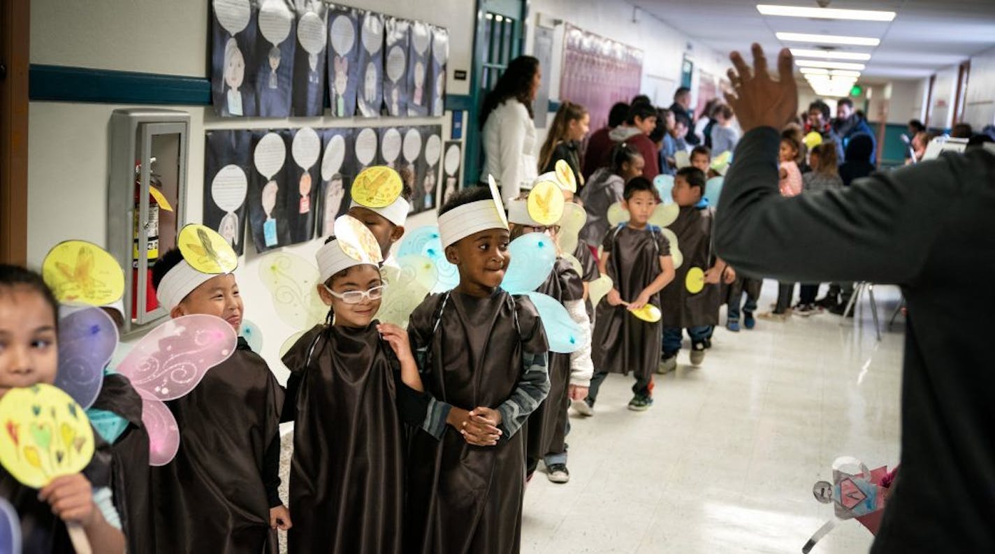 A four-story addition to American Indian Magnet School is one of two projects that could get a green light from the St. Paul School Board. Above, second-graders dressed as eagles participated in an indoor parade for Indigenous Peoples Day on Oct. 8, 2018.