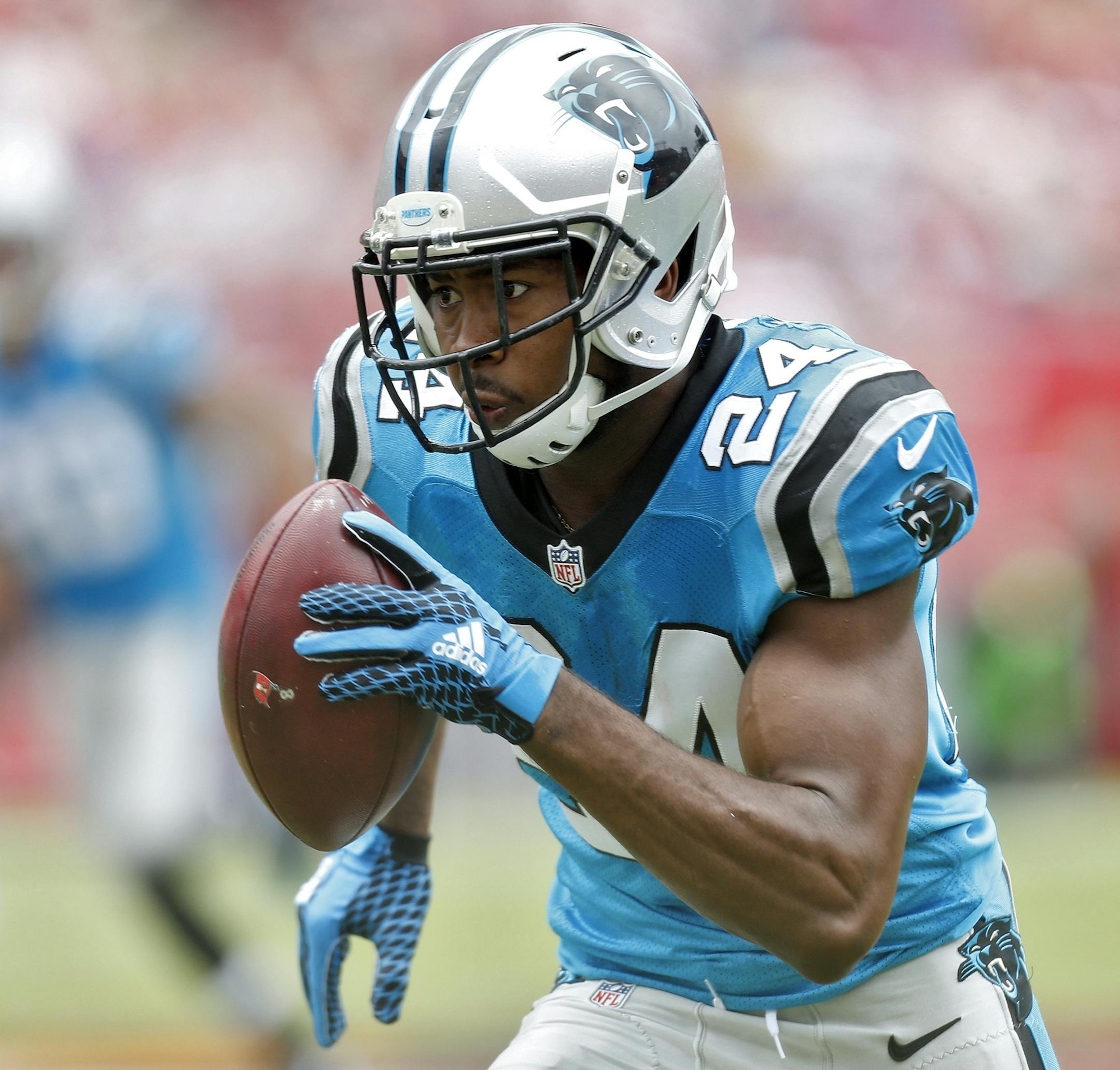 Carolina Panthers cornerback Josh Norman (24) heads for the end zone after intercepting a pass from Tampa Bay Buccaneers quarterback Jameis Winston during the first quarter of an NFL football game Sunday, Oct. 4, 2015, in Tampa, Fla. (AP Photo/Brian Blanco)
