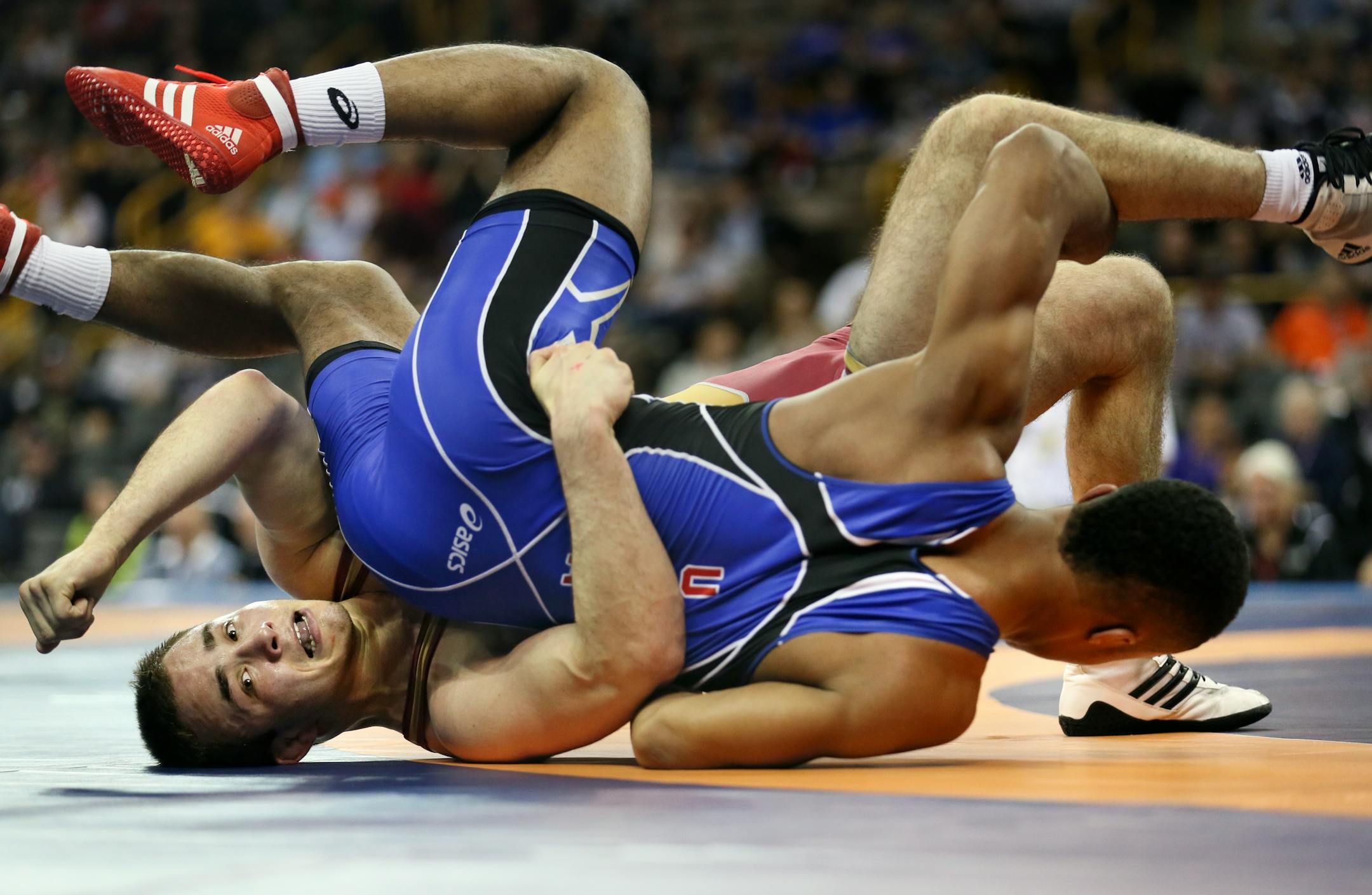 Apple Valley's Mark Hall, right, won his first match Sunday morning against Logan Massa at the 2016 Olympic Team Trials in Iowa City.