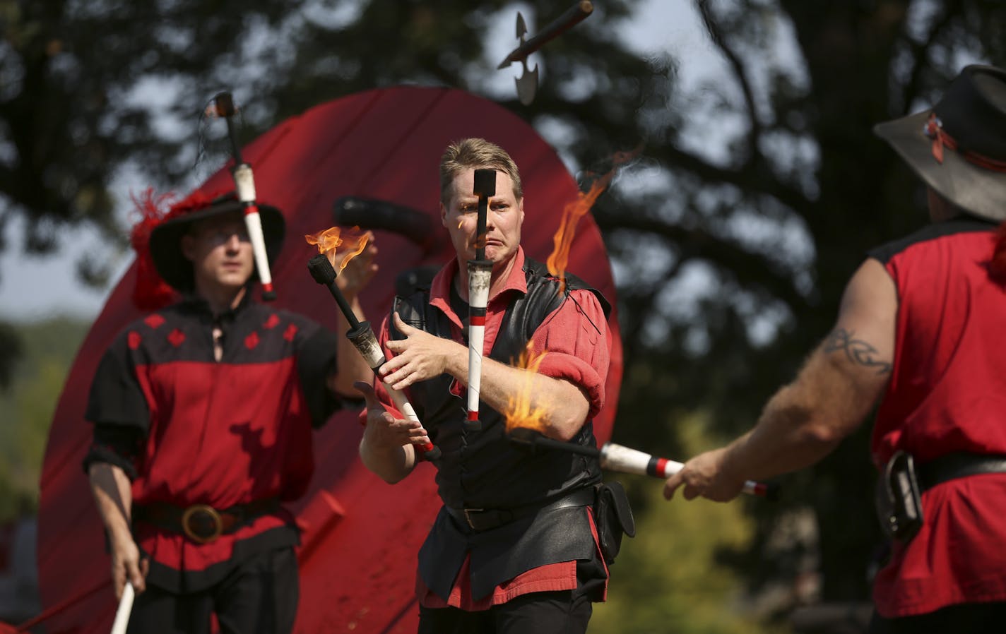 The Danger Committee performed their show comprised of feats of skill and "escalating stupidity" at the Minnesota Renaissance Festival Sunday afternoon. They are, from left, Jason LeMay, Caleb McEwen, and Mick Lunzer. ] JEFF WHEELER &#xef; jeff.wheeler@startribune.com The 45th season of the Minnesota Renaissance Festival is underway in Shakopee, with the theme this weekend being "Silk Road: Discover the Riches." The fair was photographed Sunday afternoon, August 30, 2015 in Shakopee. The fair ru