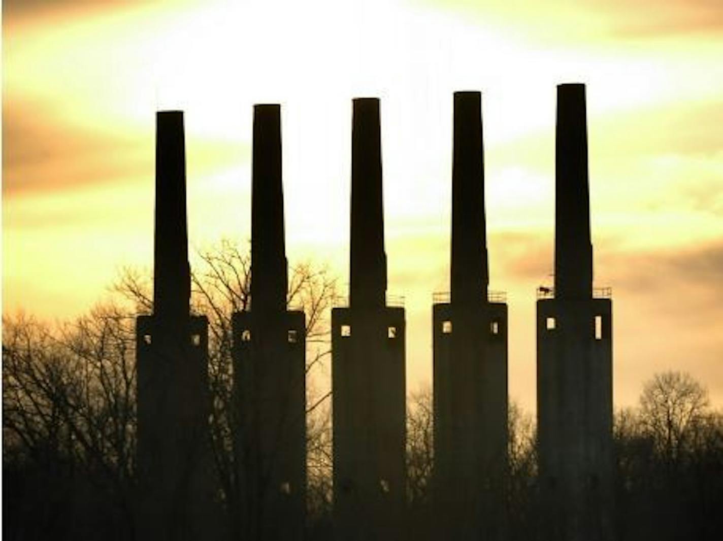 These five towers, seen in 2006, are a remnant of the Gopher Munitions Works, a WW II-era munitions plant in Rosemount. They are being demolished to redevelop the site, not part of UMore Park.