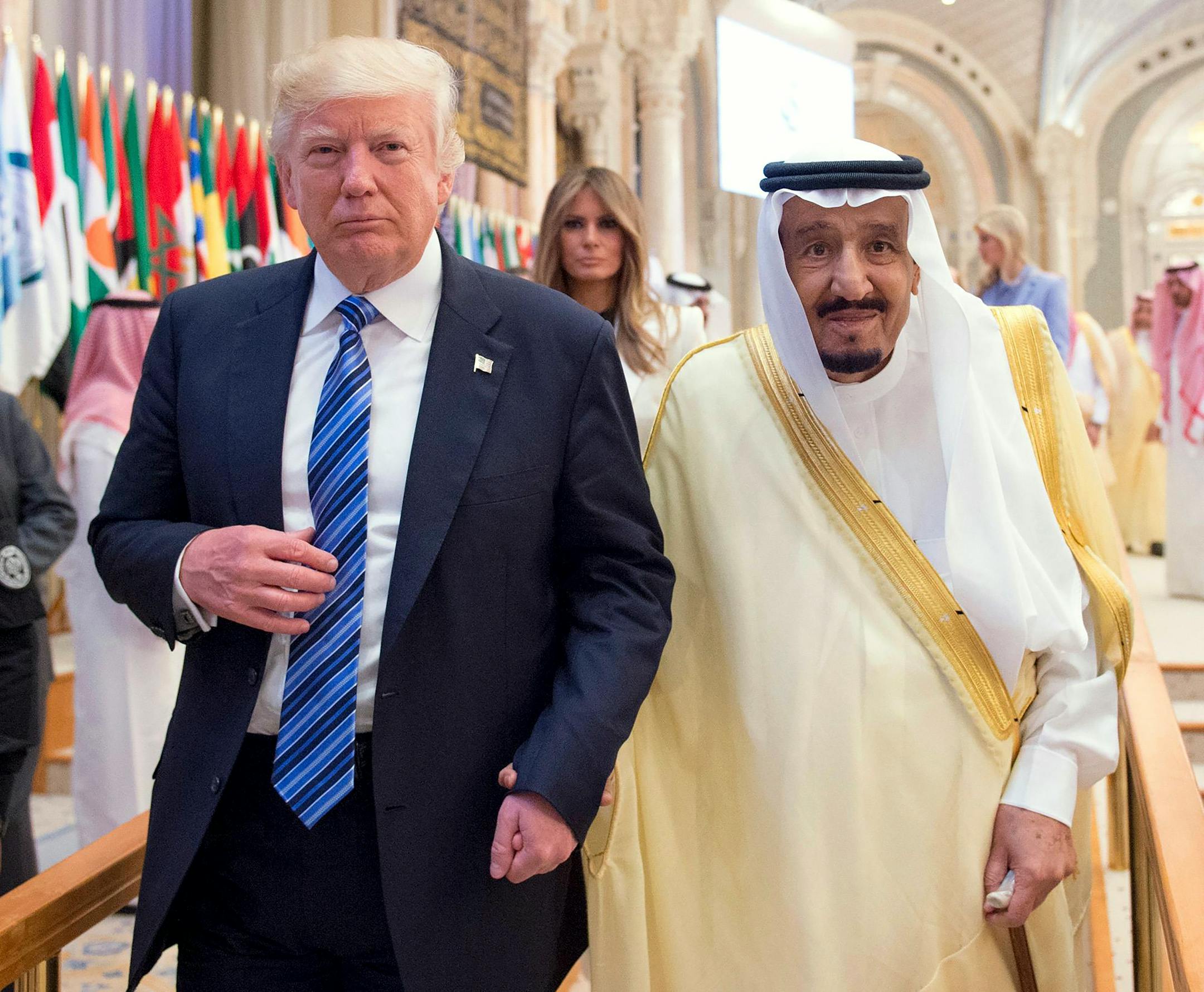 A handout photo of President Donald Trump and Saudi Arabia�s King Salman at the opening session of the Gulf Cooperation Council summit in Riyadh, Saudi Arabia, May 21, 2017. In his centerpiece speech Sunday, Trump was aiming to reconcile his past campaign rhetoric with his ambition of rebuilding relations with the Muslim world. In the background is first lady Melania Trump. (Saudi Press Agency Handout via The New York Times) -- NO SALES--