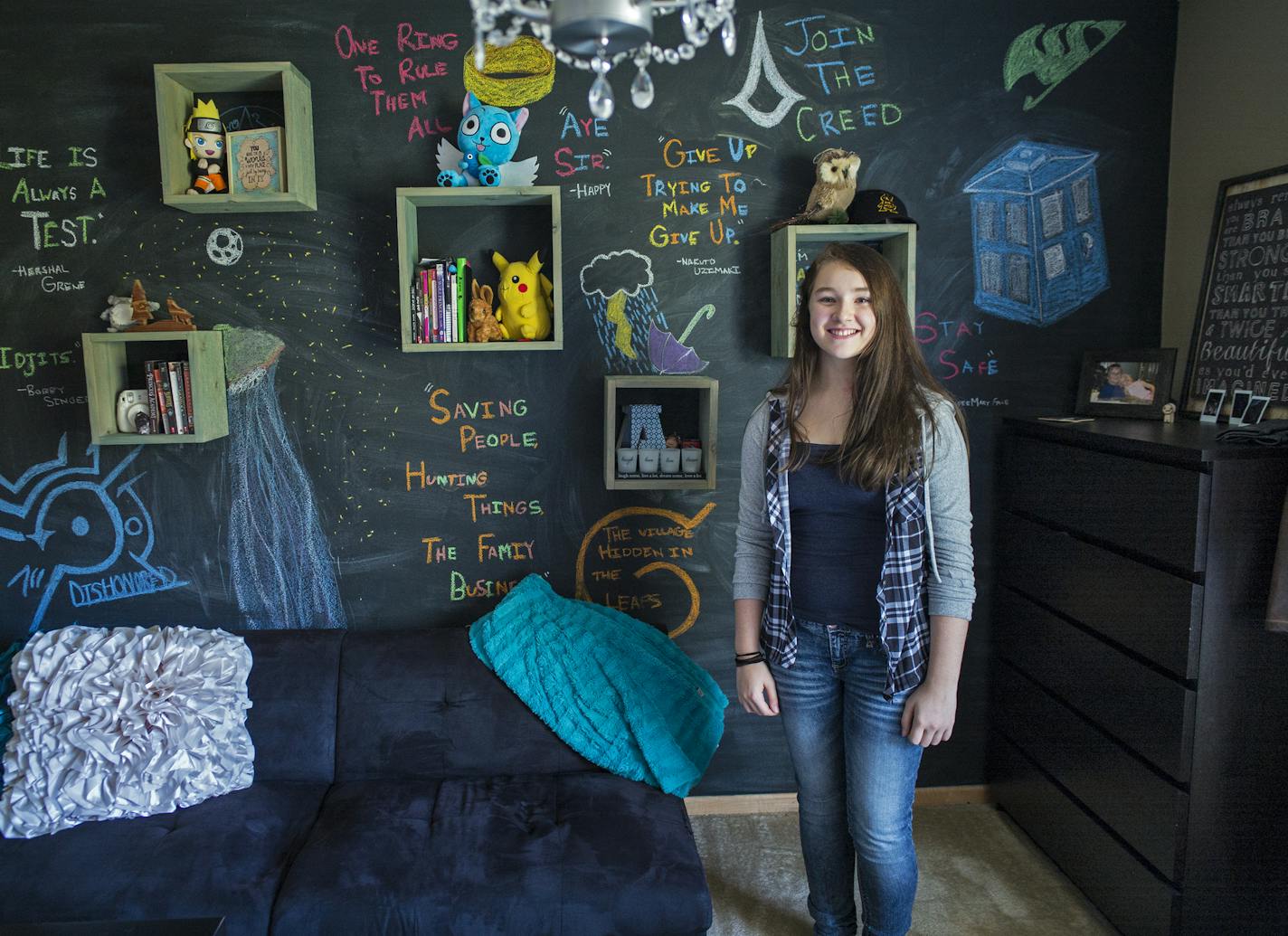 Abigail Opstad,12, has a room that reflects her interest in anime and art. One wall has a chalkboard paint and cubbies for her favorite things.]Richard Tsong-Taatarii/rtsong-taatarii@startribune.com