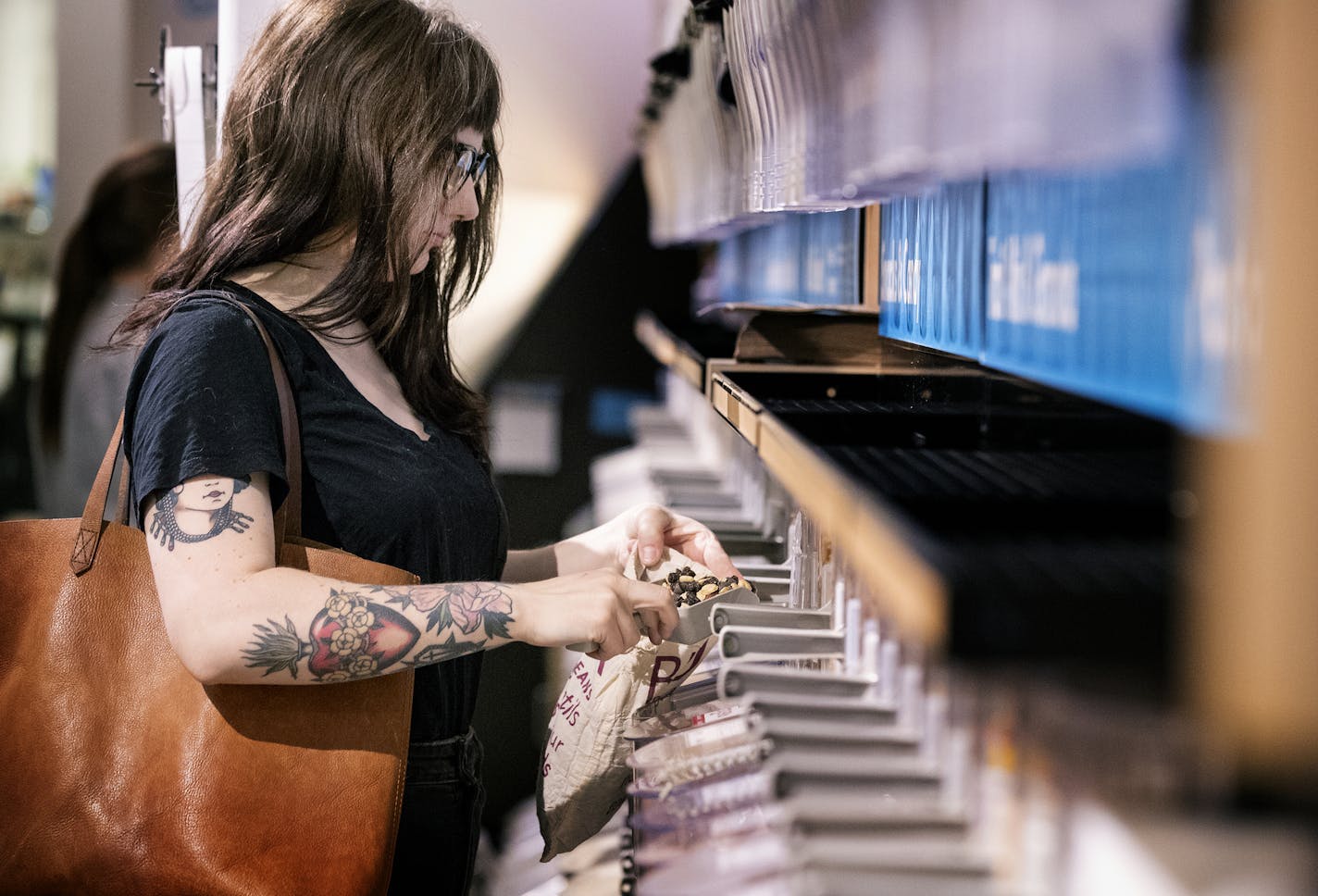 Erika Larson filled up her own bag from a bulk bin at the Wedge Community Co-op in Minneapolis.