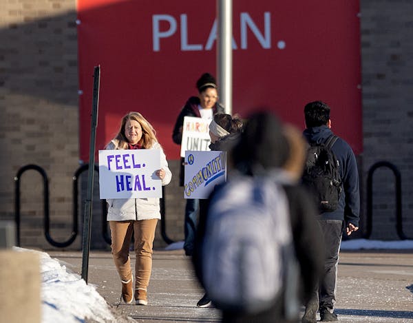 Students made their way back to Harding High School in St. Paul on Friday.